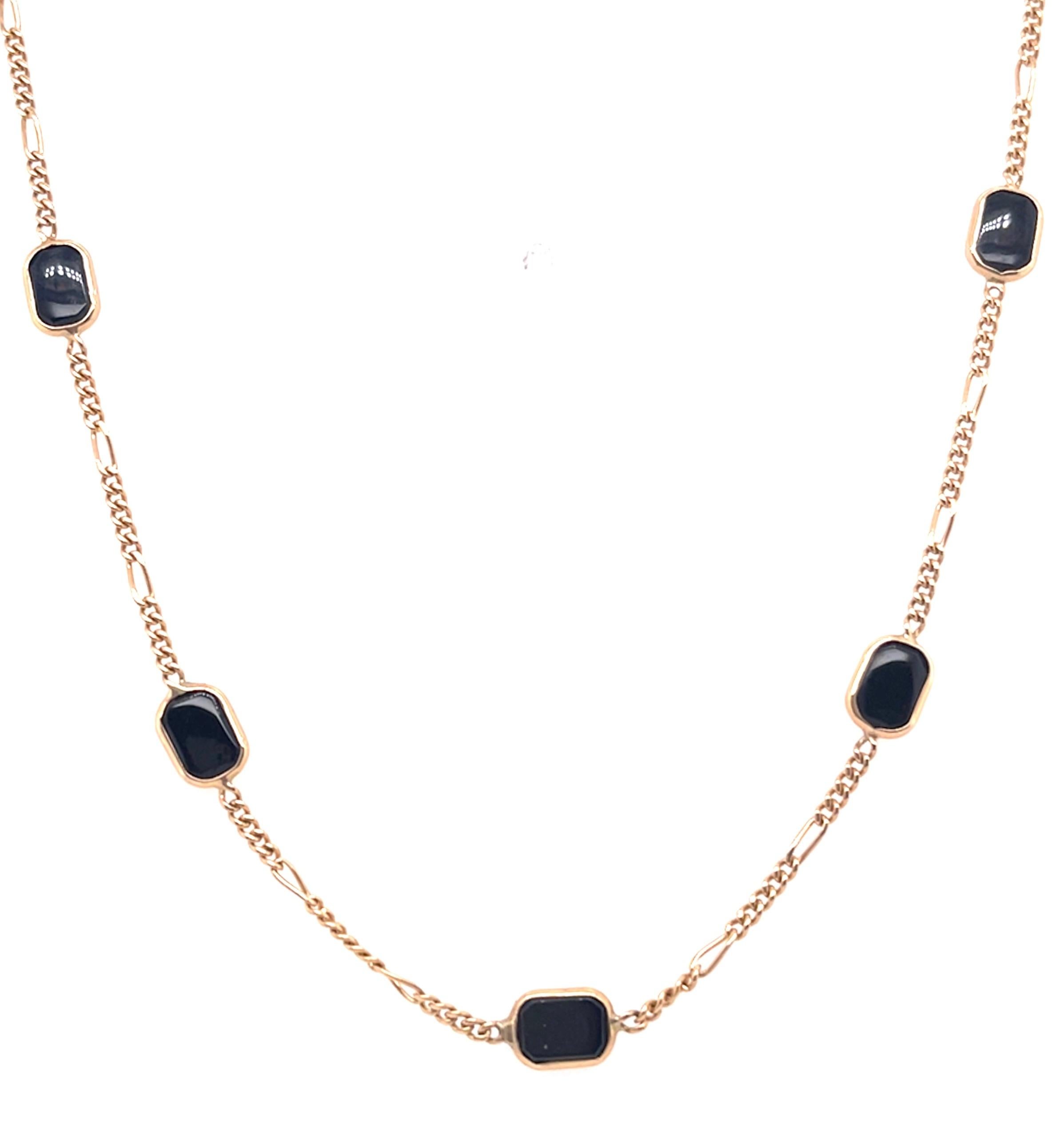14 Karat Yellow Gold 18 Inch Black Onyx Figaro Necklace
8 piece Black Onyx.
6 mm width
5.41 grams total weight.