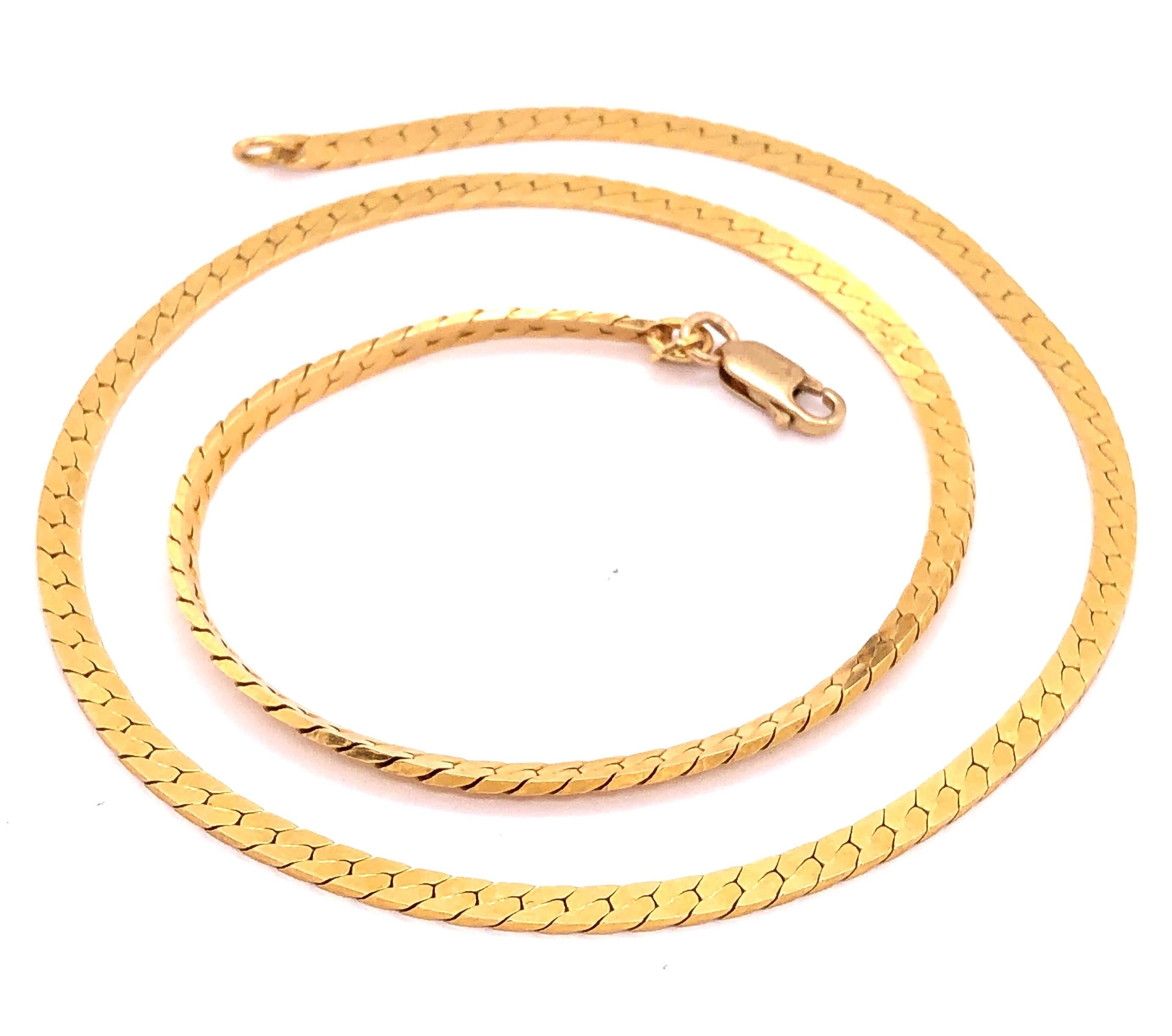 Collana a serpente in oro giallo 14 carati.
18 pollici 
15.8 grammi di peso totale.