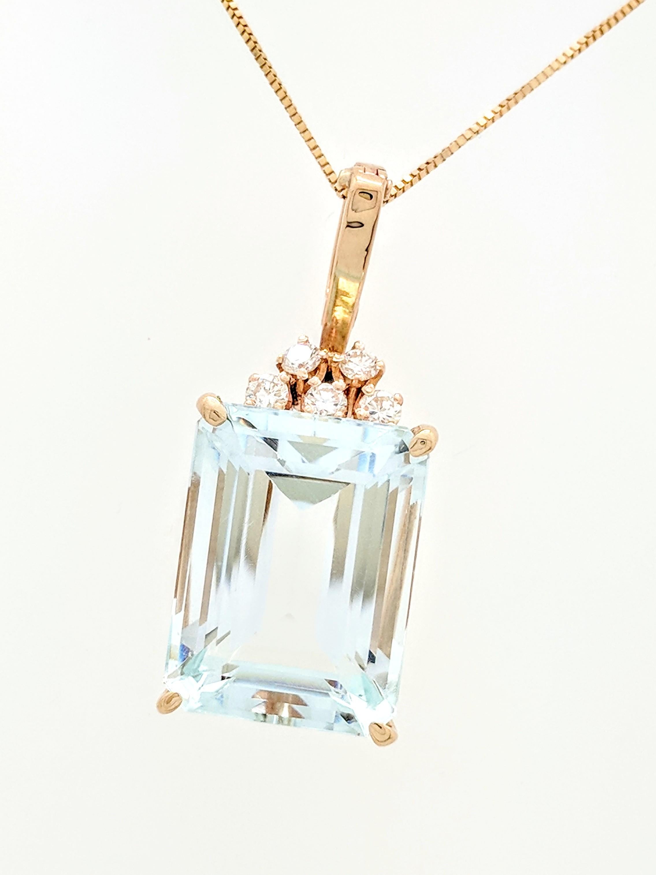You are viewing a beautiful aquamarine & diamond pendant necklace. This necklace is crafted from 14k yellow gold and weighs 12.2 grams. The pendant features (1) 21ct natural emerald cut aquamarine and (5) .10ct round natural brilliant cut diamonds.