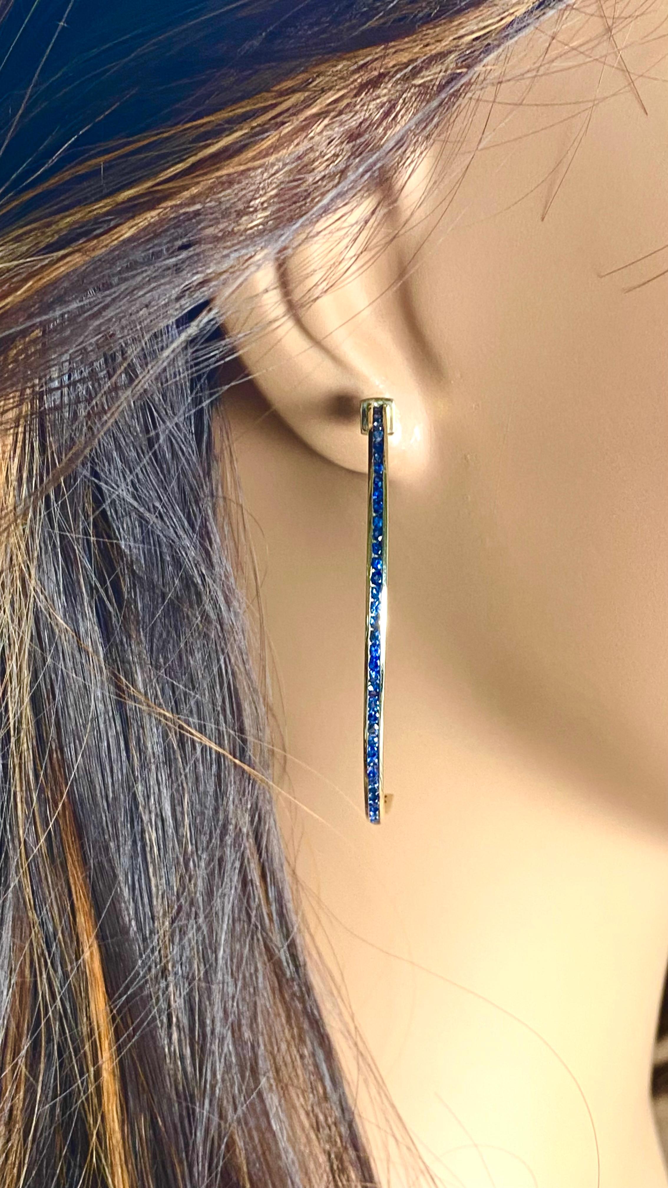 Round Cut 14 Karat Yellow Gold 2.25 Inch Long Hoop Earrings Channel Set Blue Sapphires For Sale