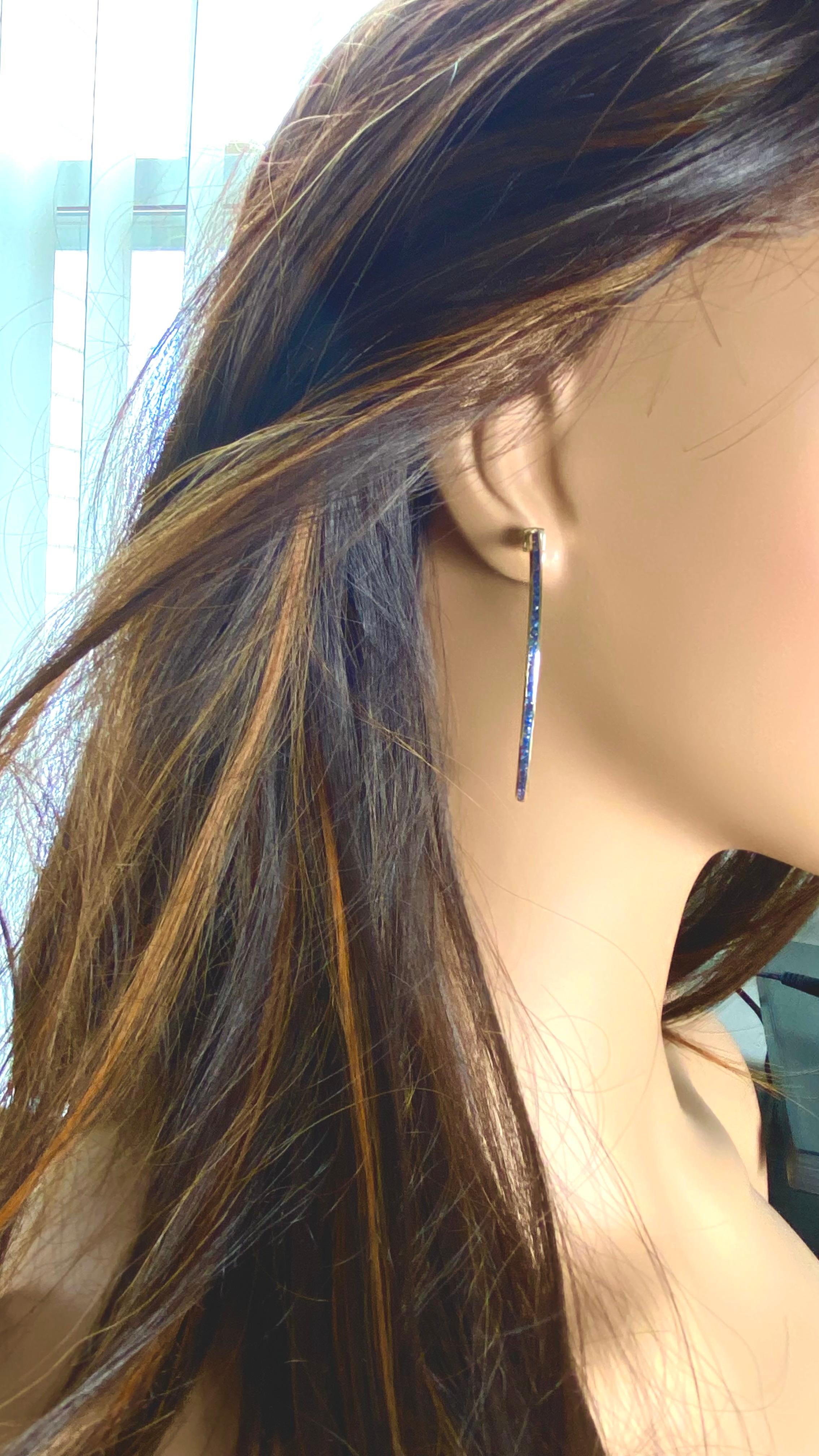 Women's 14 Karat Yellow Gold 2.25 Inch Long Hoop Earrings Channel Set Blue Sapphires For Sale