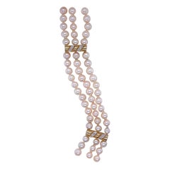 14 Karat Yellow Gold 3 Strand Pearl Bracelet with Diamond Detail