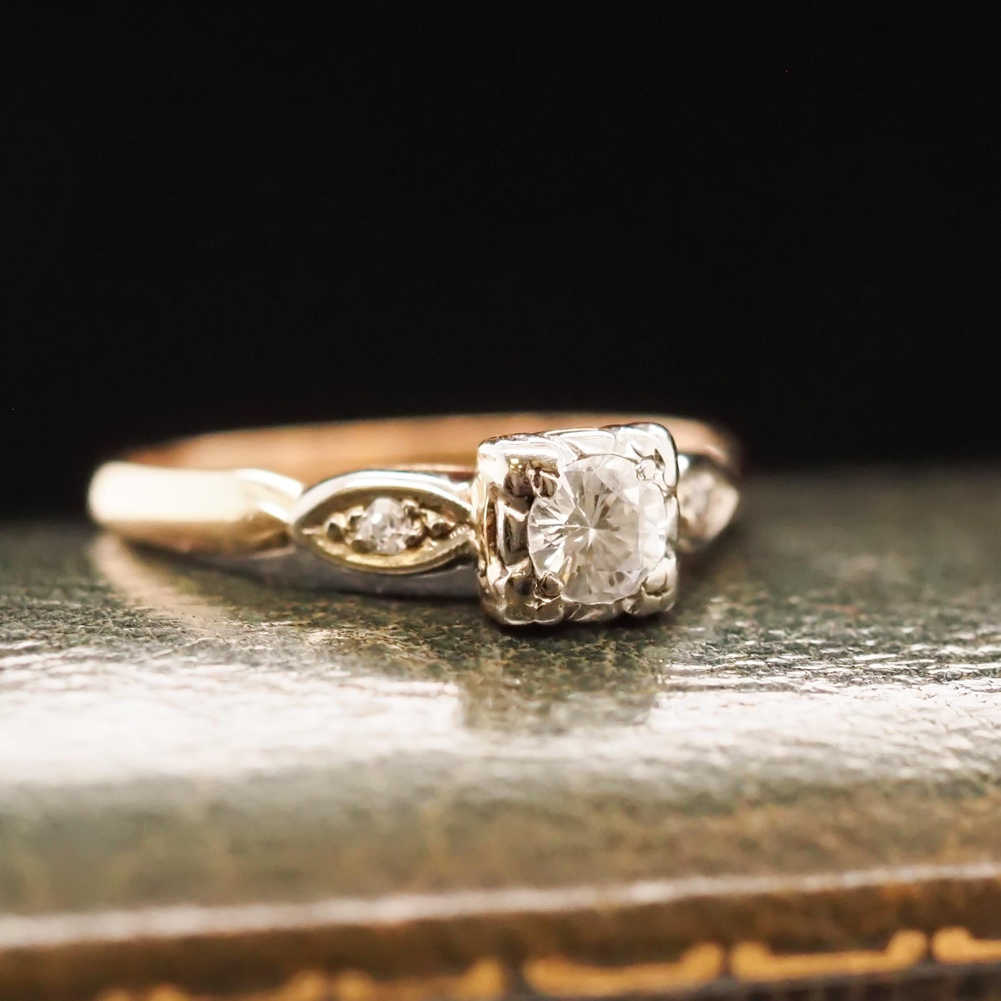 Year: 1943
Item Details:
Ring Size: 7.5
Metal Type: 14K Yellow Gold [Hallmarked, and Tested]
Weight: 2.3grams
Diamond Details: .30ct, Old European Brilliant, Natural Diamond, G Color, VS Clarity
Side Stone Details: .04ct, Antique Round, G-H, VS
