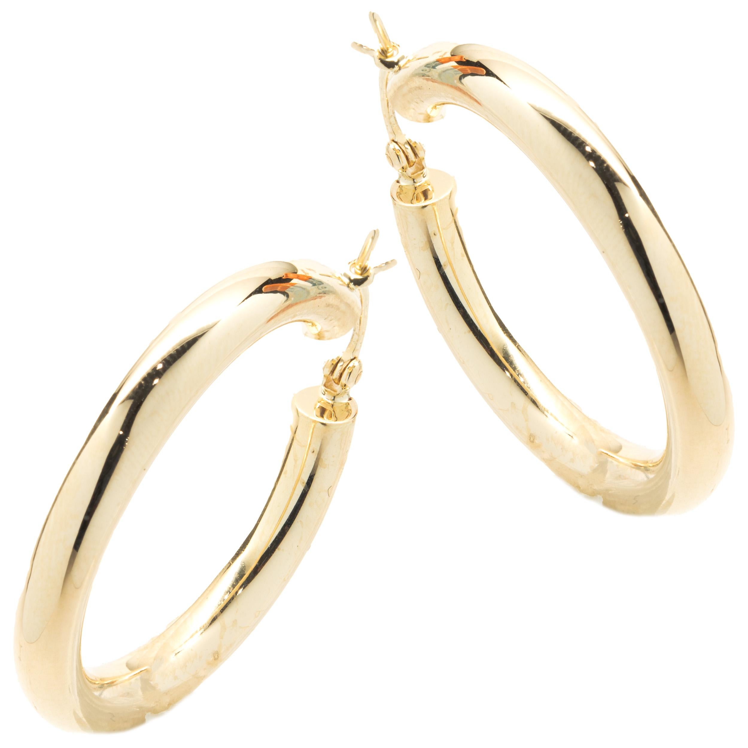 Material: 14K yellow gold
Dimensions: earrings measure 30mm in length
Weight:  3.48 grams
