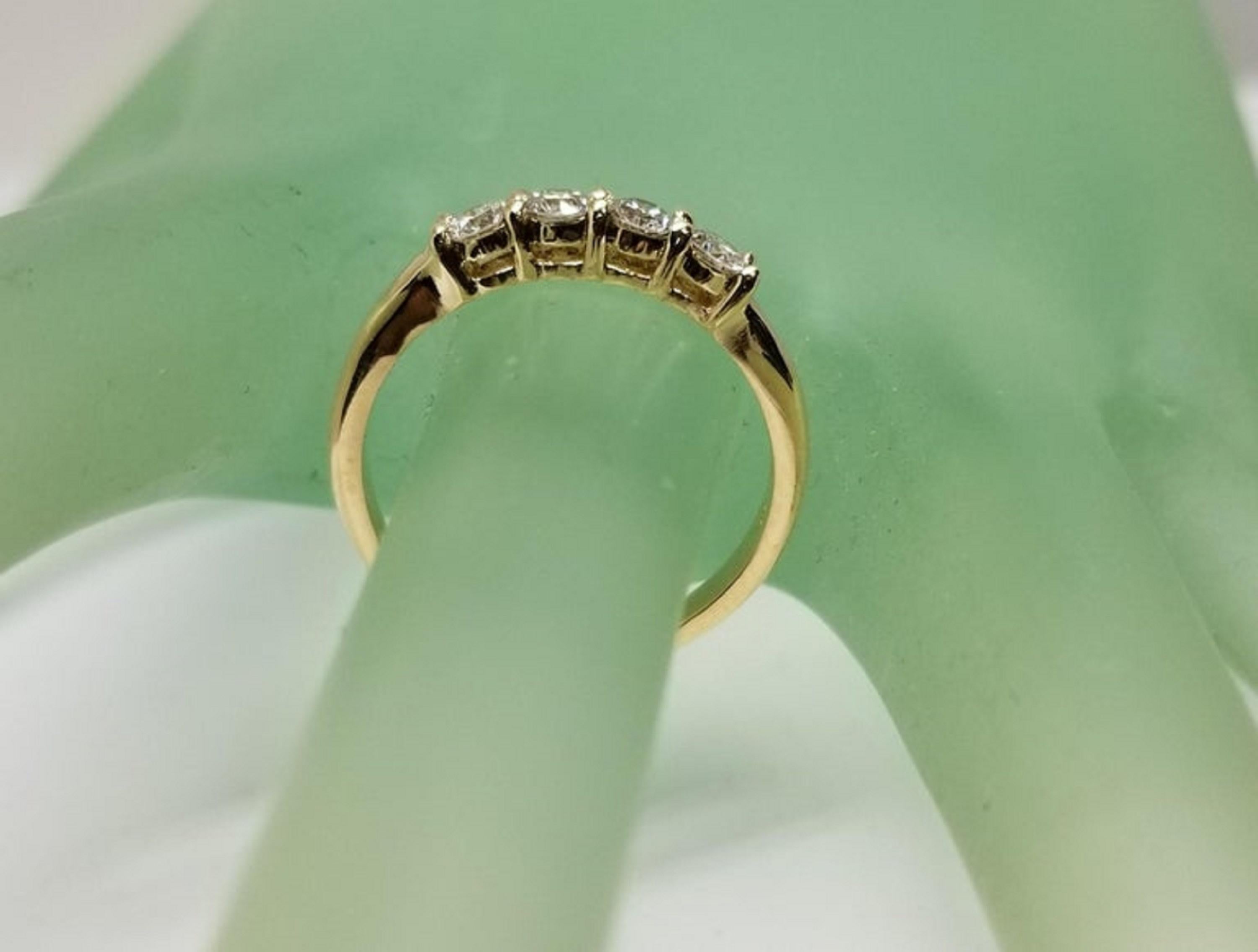 Contemporary 14 Karat Yellow Gold 4 Diamond Ring Wedding Anniversary Ring .44 Pts For Sale