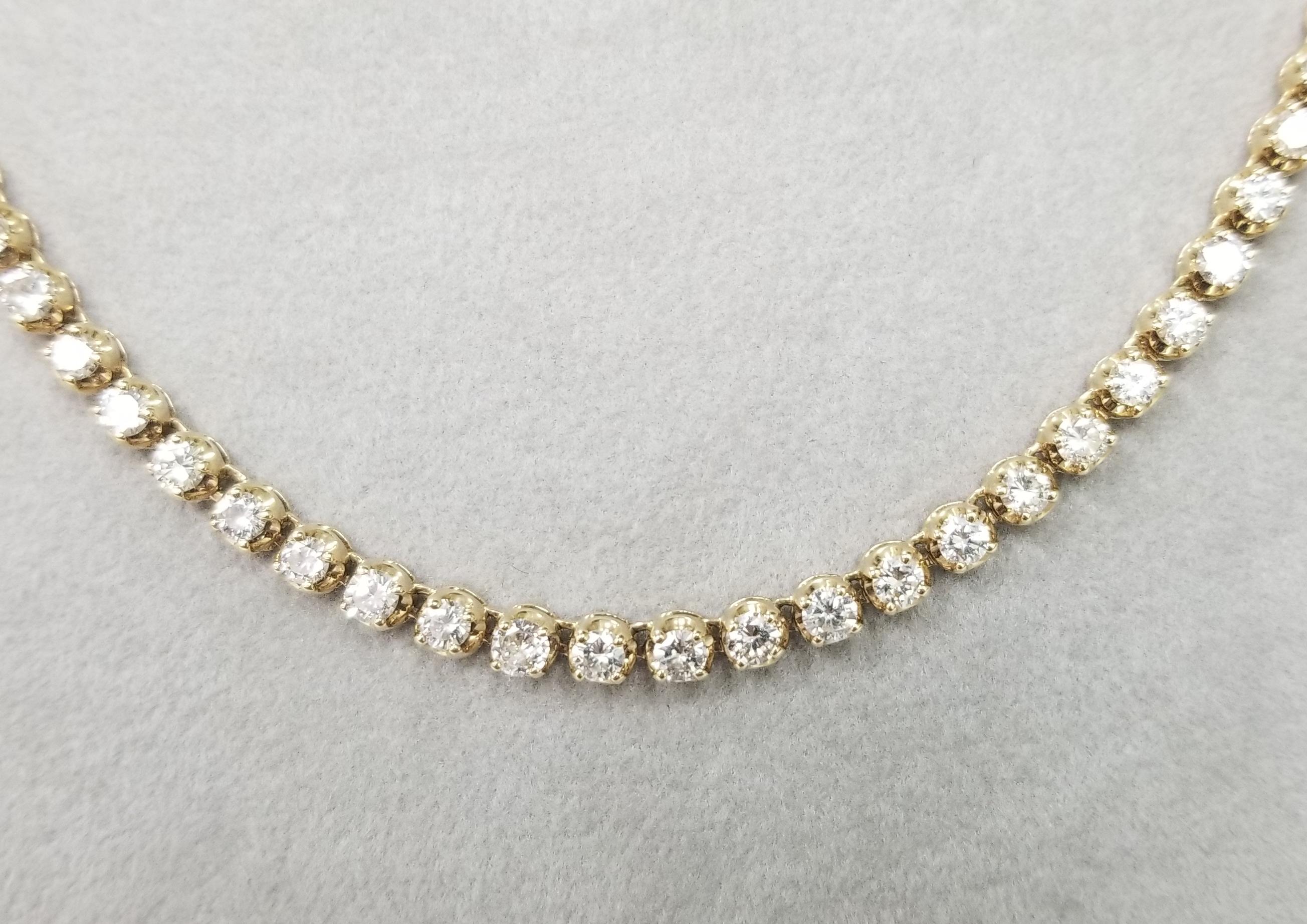 14 Karat Yellow Gold 4 Prong Diamond Necklace 11.41 Carat with plunger and safety clasp, containing 
 Specifications:
    main stone: ROUND CUT DIAMONDS
    diamonds: 97 PIECES
    carat total weight: 11.41cts.
    color: G
    clarity: VS2
   
