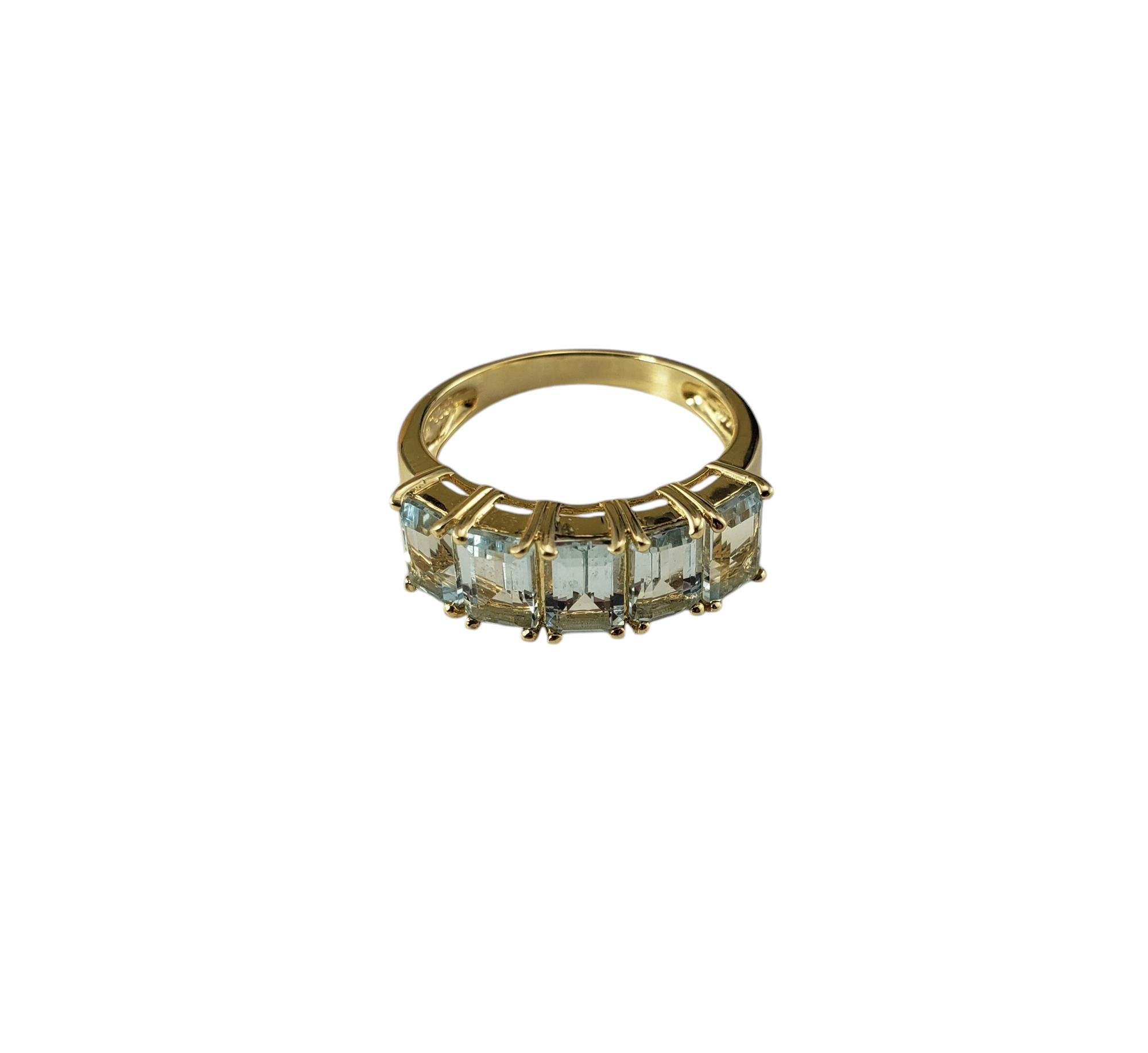 14 Karat Yellow Gold and Aquamarine Band Ring Size 7.25 JAGi Certified-

This stunning band features five emerald cut aquamarine stones set in classic 14K yellow gold. Width: 7 mm. Shank: 3 mm.

Approximate total aquamarine weight: 2.30 ct.

*Stone