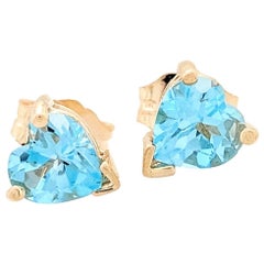14 Karat Yellow Gold .50 Carat Heart Shaped Blue Topaz Stud Earrings