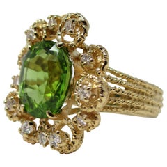 Anello in oro giallo 14 carati con peridoto e diamanti da 5,52 carati