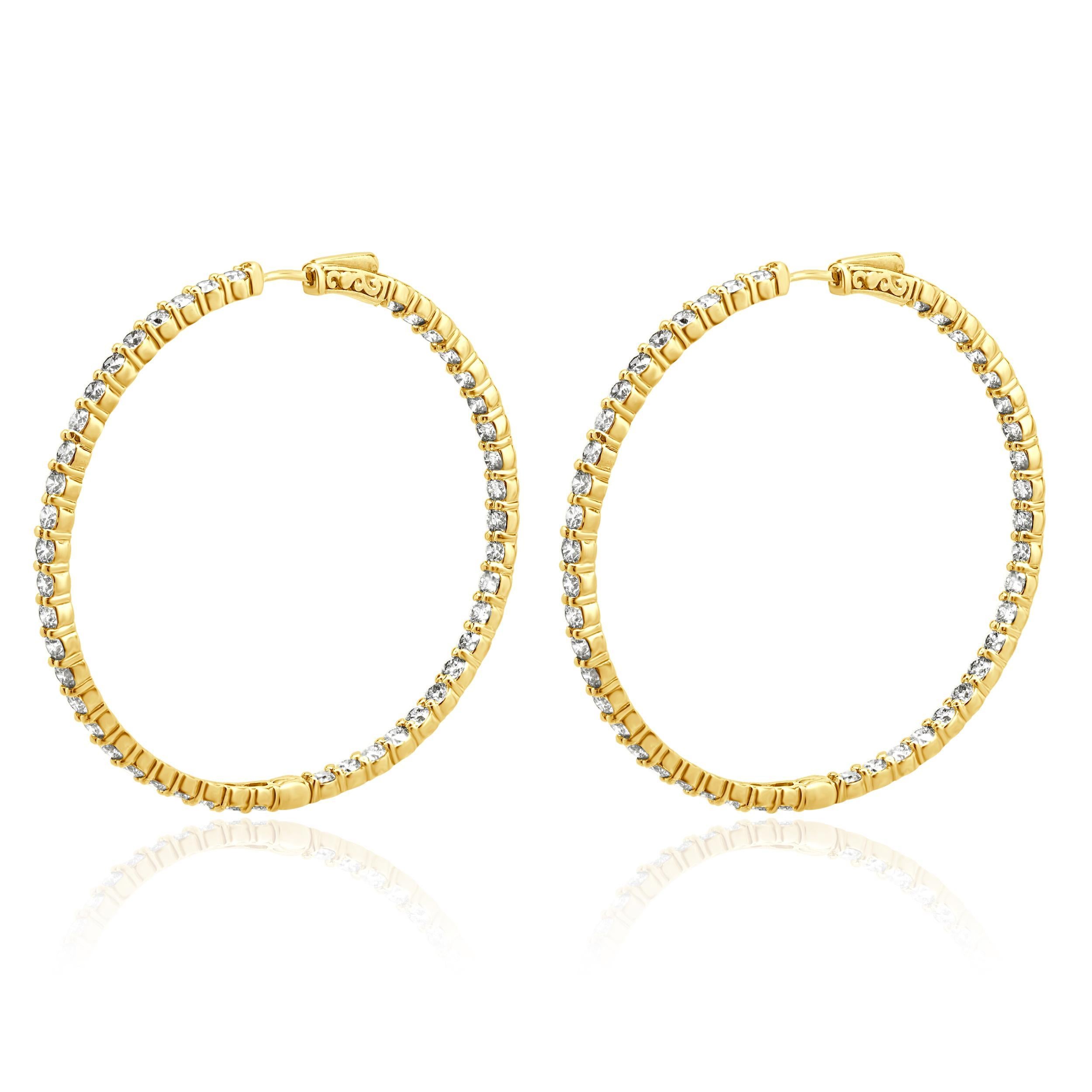 Matériau : Or jaune 14K
Diamants : taille ronde brillante = 8,90cttw
Couleur : G
Clarté : VS2-SI1
Dimensions : les boucles d'oreilles mesurent environ 56 mm de large.
Fermeture : boutons-pression
Poids : 16.80 grammes