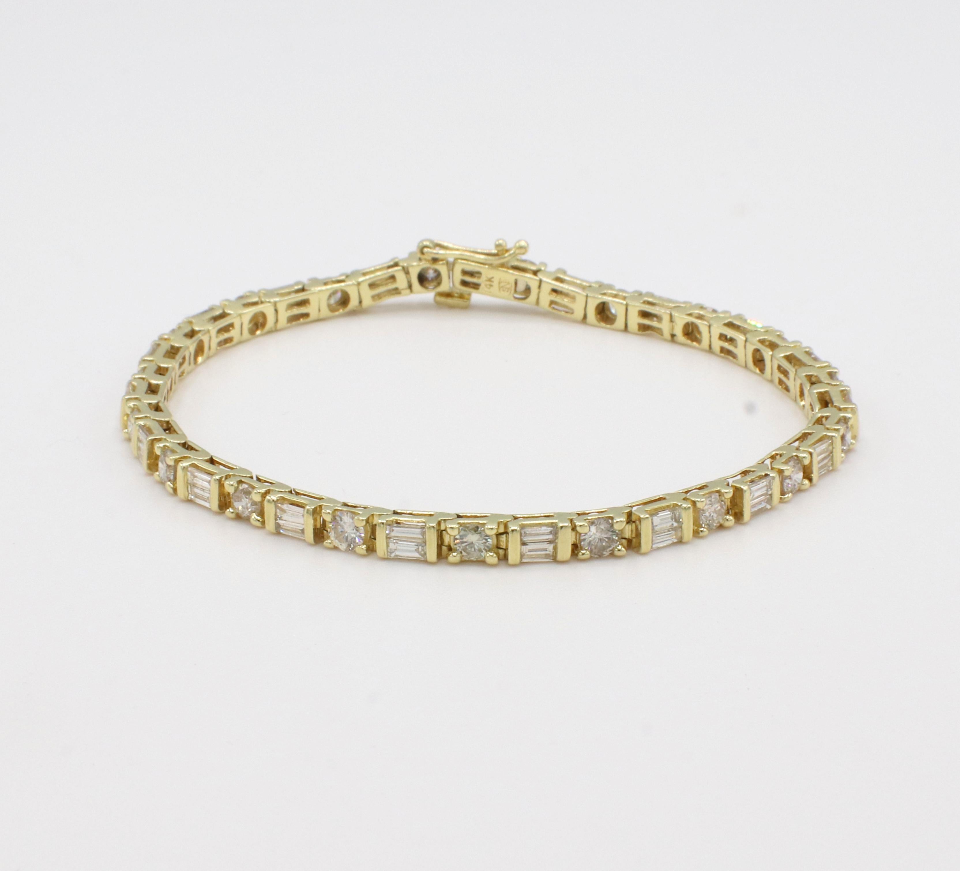 14 Karat Yellow Gold 6 Carat Baguette & Round Natural Diamond Tennis Line Bracelet
Metal: 14k yellow gold
Weight: 14.4 grams
Diamonds: Approx. 6 CTW H-I VS round and baguette natural diamonds 
Length: 7.5 inches
Width: 3.5mm
