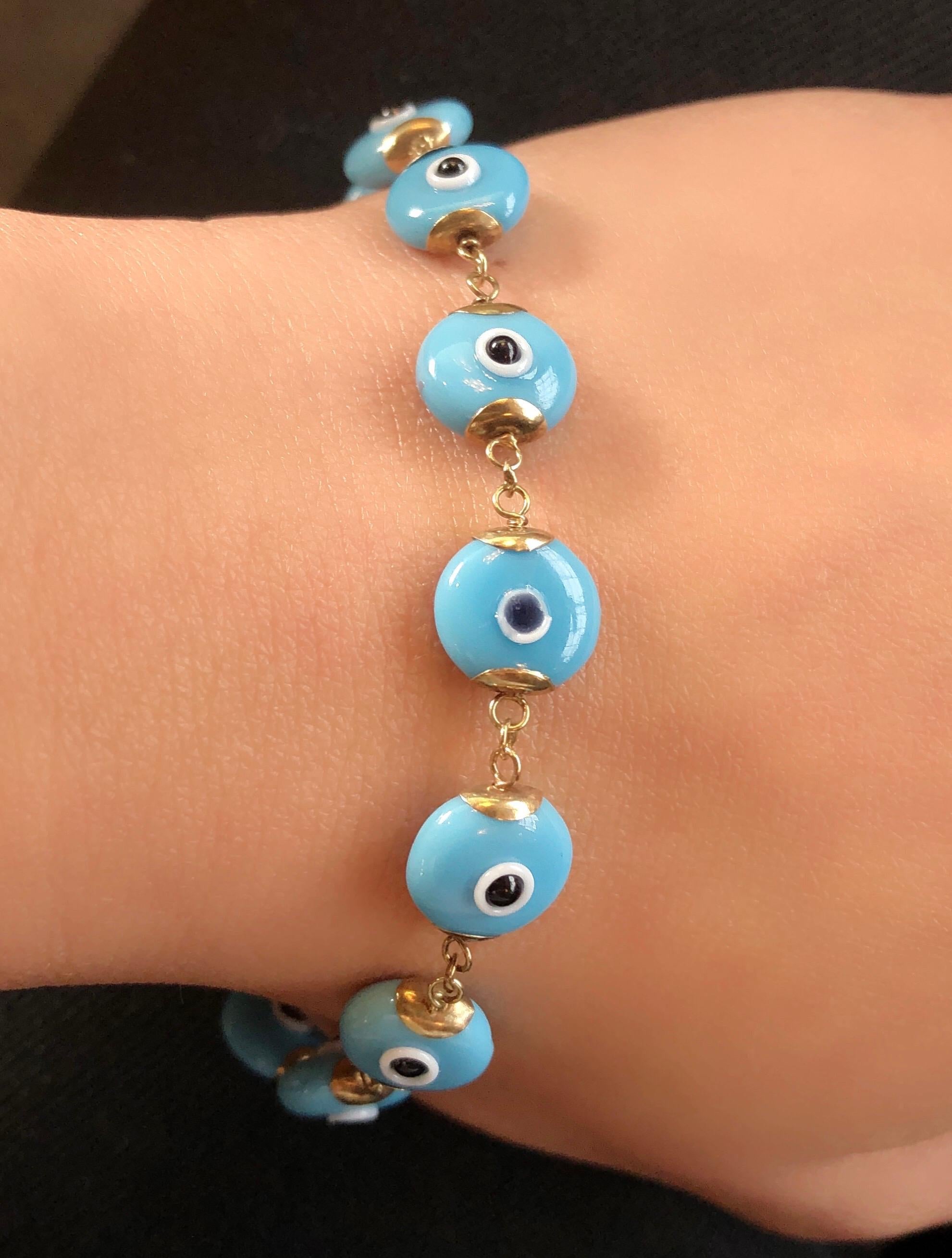 Modern 14 Karat Yellow Gold Blue Ceramic Evil Eye Charm Bracelet For Sale