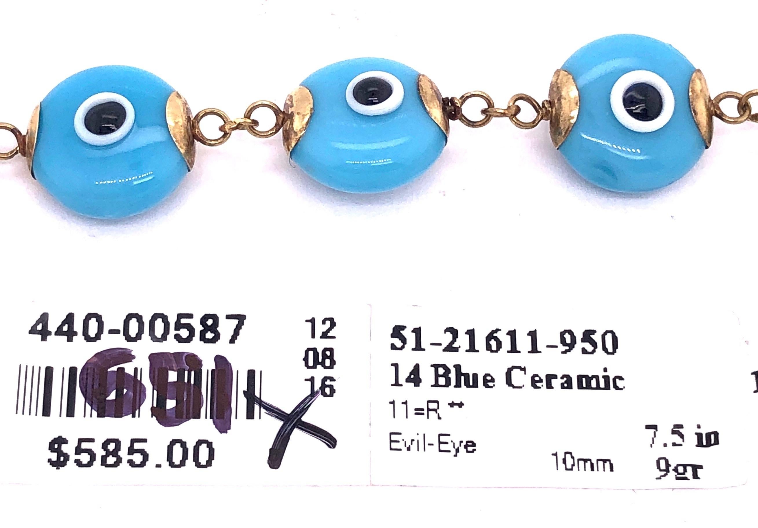 14 Karat Yellow Gold Blue Ceramic Evil Eye Charm Bracelet In Good Condition For Sale In Stamford, CT