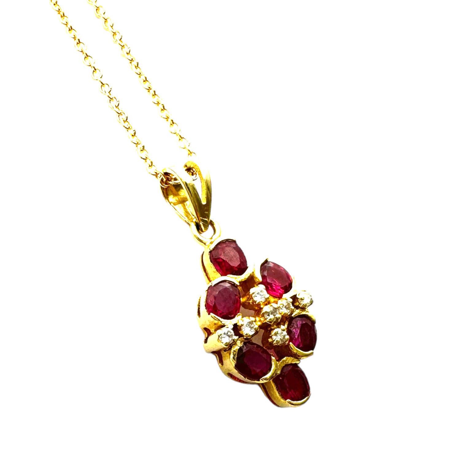 This 14 Karat yellow gold pendant features a stunning cluster of .75CTW oval-cut ruby and diamond stones. With its exquisite craftsmanship and luxurious design, this piece is the ideal accessory for any jewelry collection.

14 Karat yellow gold