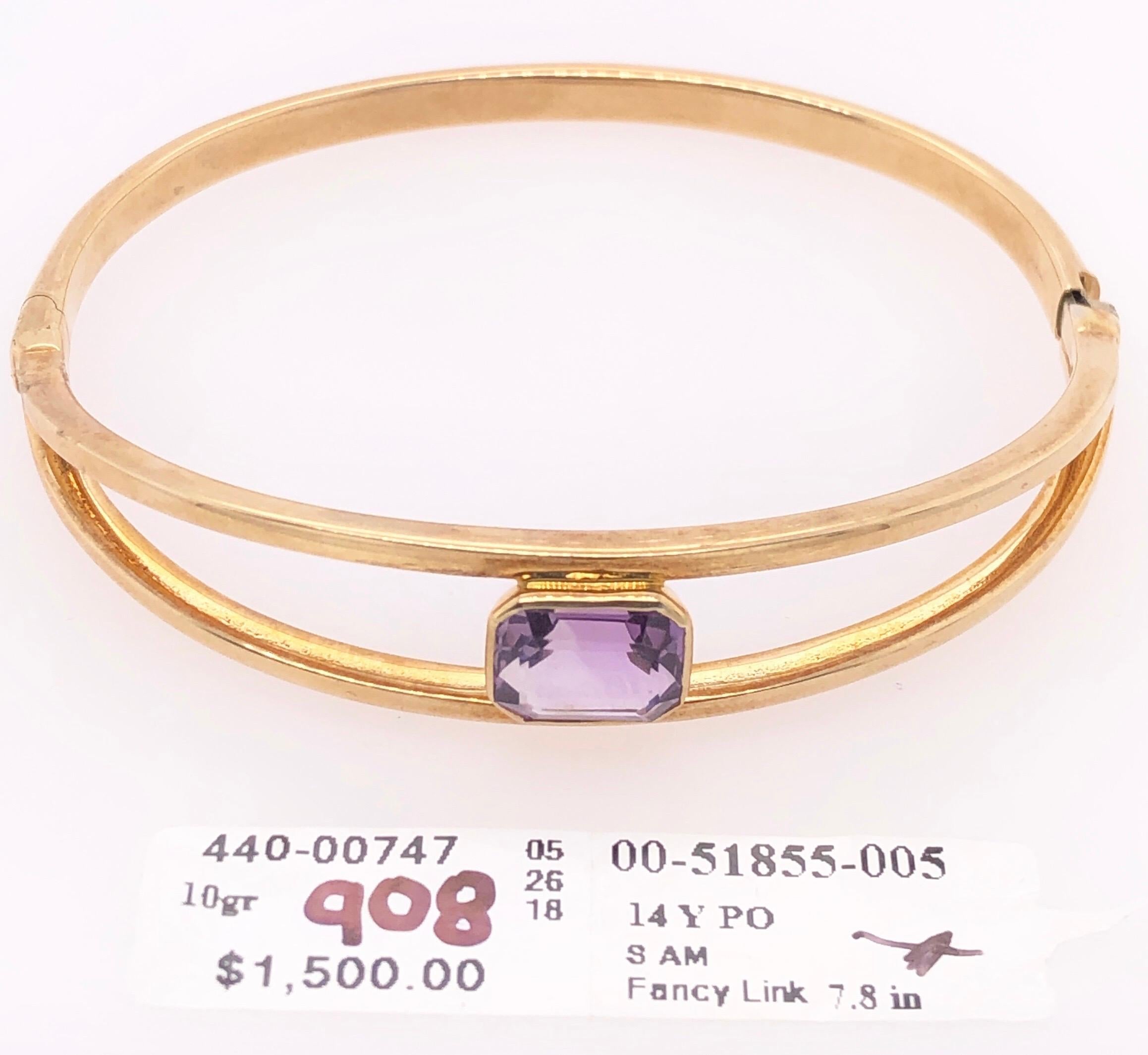 14 Karat Yellow Gold 7.8 Fancy Link Bangle with Square Amethyst Solitaire
10 grams total weight.