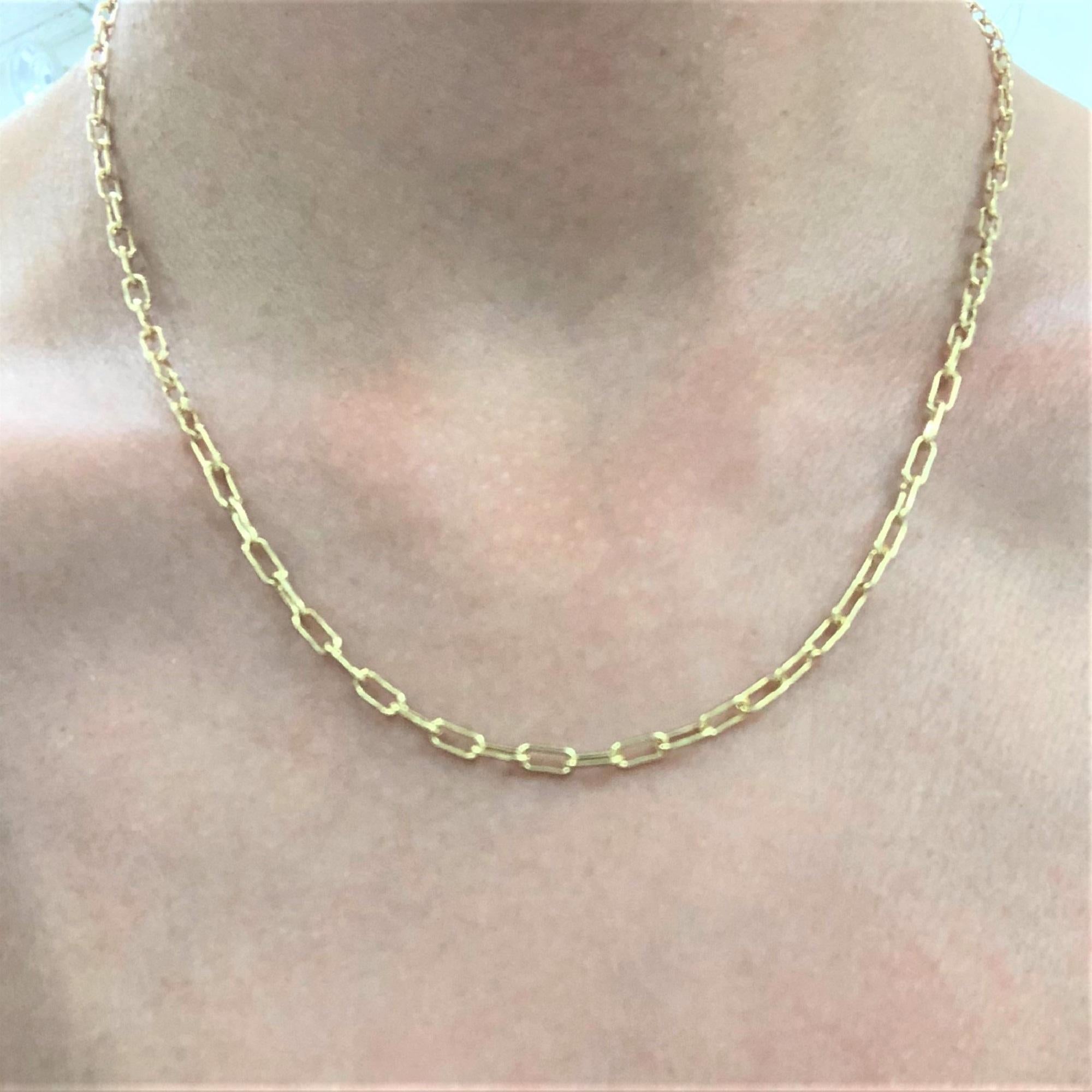 Chain necklaces are a classic staple in any person's jewelry box! This 14k yellow gold Small Oval paper-clip chain necklace comes with plenty of options, specifically your choice of length. Buy one and wear it as a simple standalone (with or without