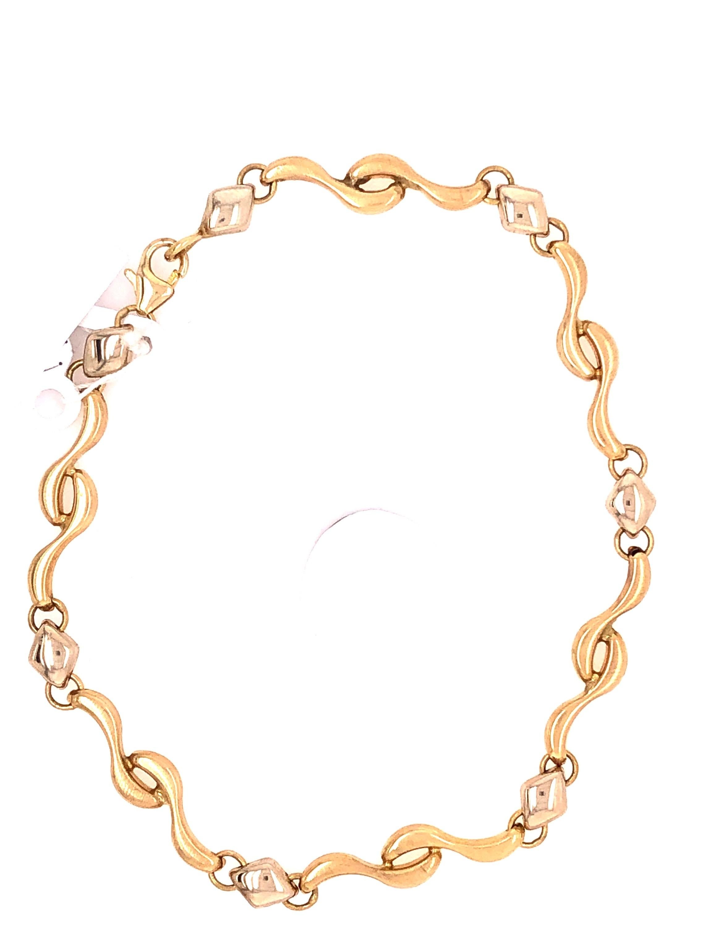 14 Karat Yellow Gold 8 Inch Fancy Link Bracelet.
7 grams total weight.
