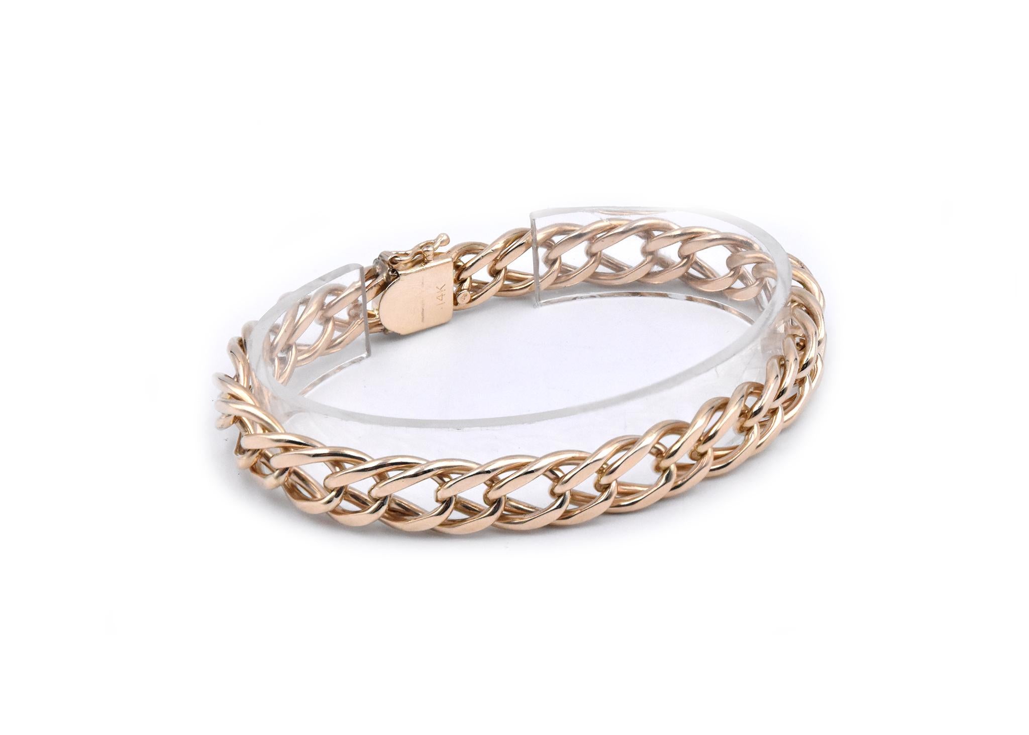 Designer: custom 
Material: 14k yellow gold
Dimensions: the bracelet will fit up to an 8 -inch wrist
Weight: 36.7 grams
