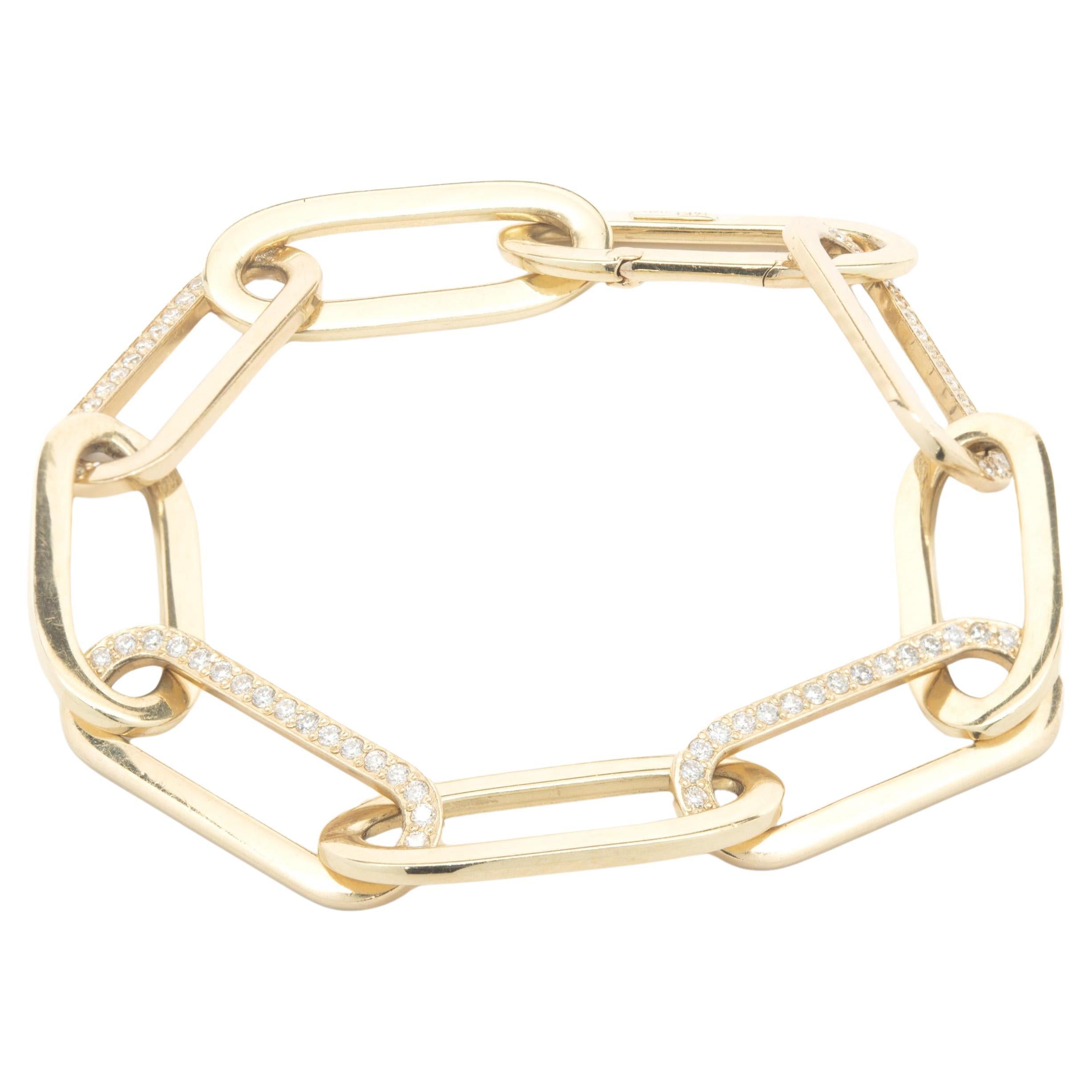 Ovales Gliederarmband aus 14 Karat Gelbgold mit abwechselnden Diamanten