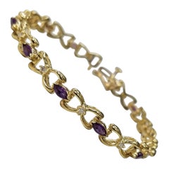 14 Karat Yellow Gold Amethyst and Diamond Bracelet