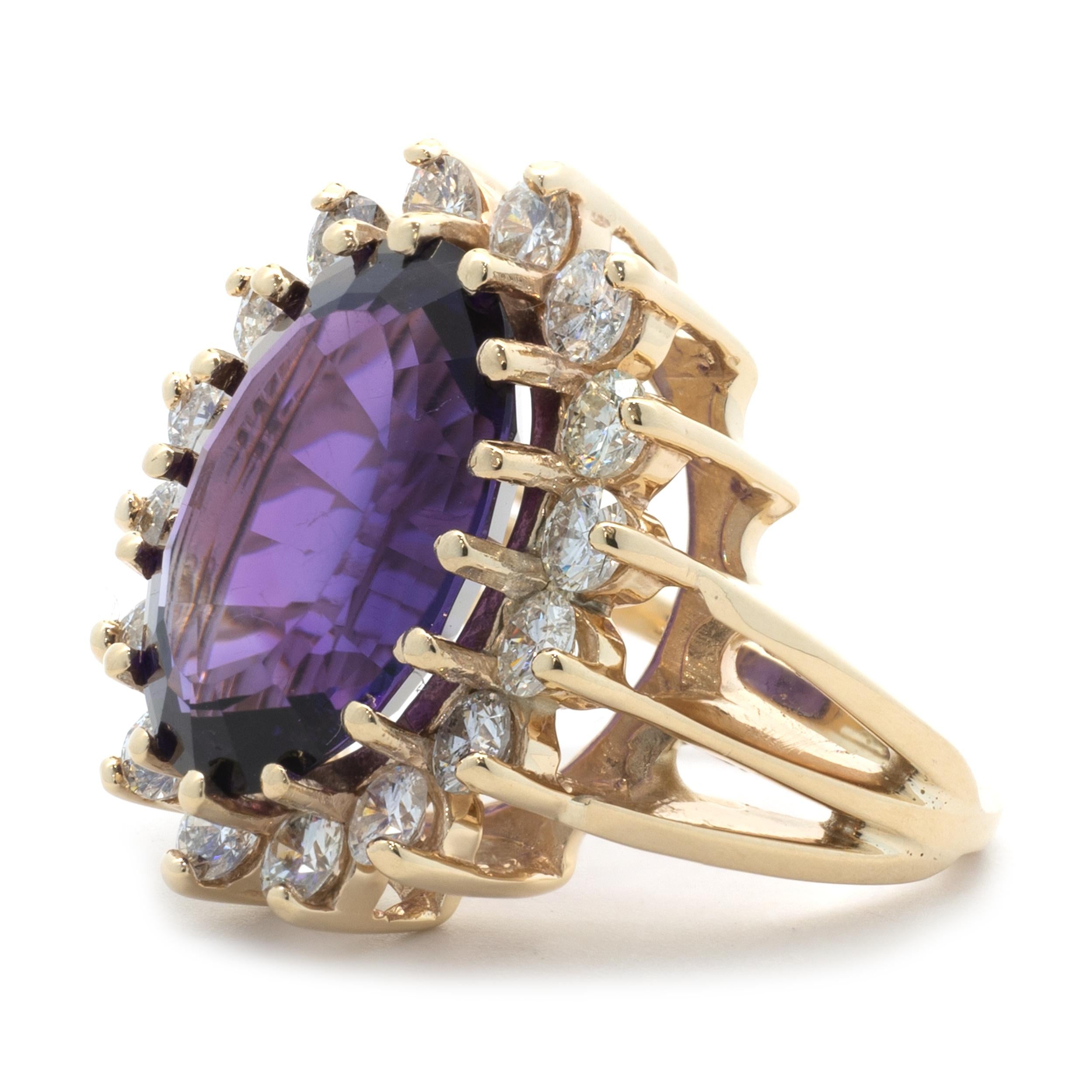 Designer: custom design
Material: 14k yellow gold
Amethyst: 1 oval cut = 9.75ct
Diamond: 16 round brilliant cut = .96cttw
Color: I
Clarity: SI1-2
Ring size: 5.5 (please allow two additional shipping days for sizing requests) 
Dimension: ring top