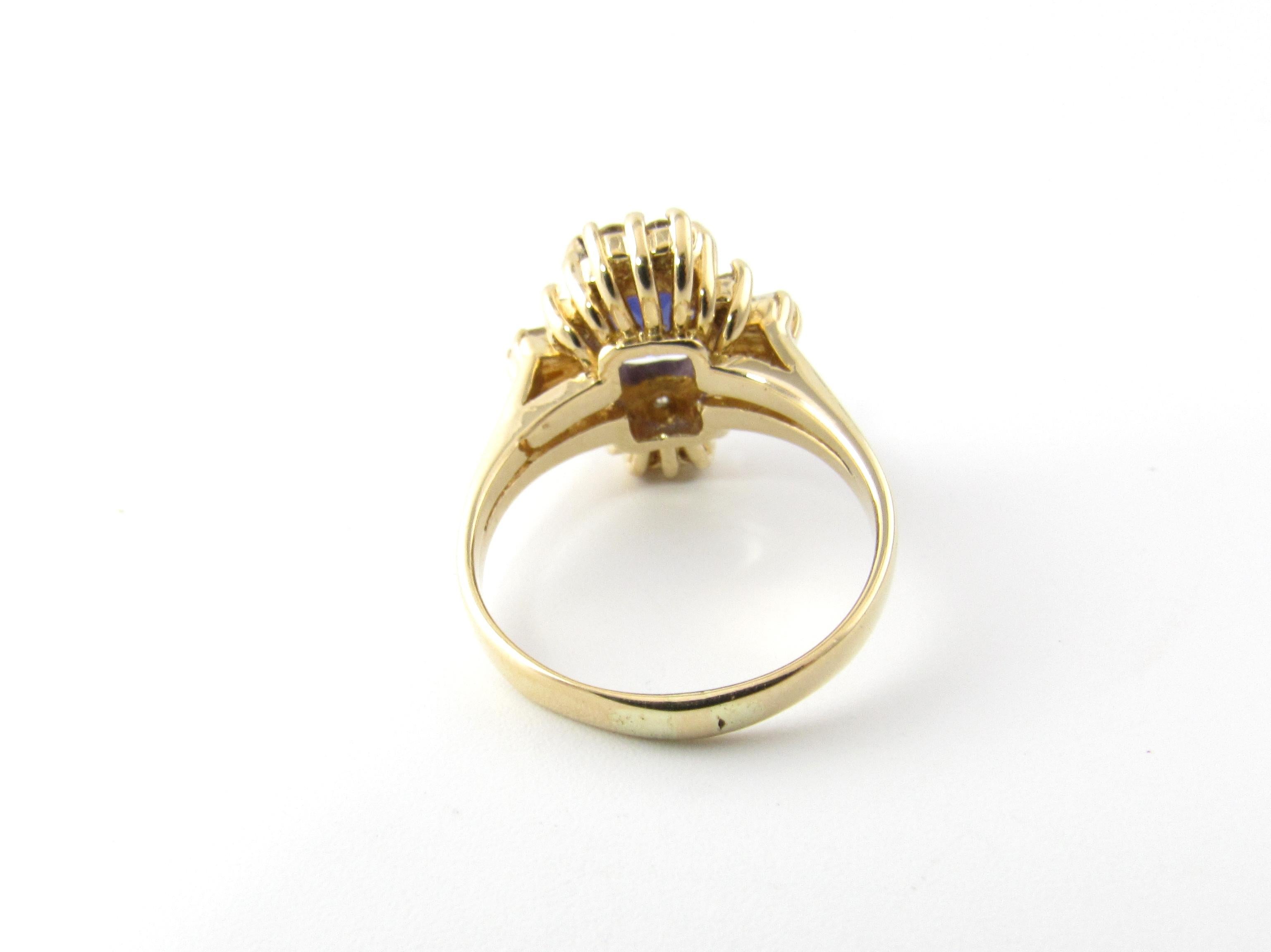 Vintage 14 Karat Yellow Gold Amethyst and Diamond Ring Size 6

This elegant ring features one oval amethyst (8 mm x 7 mm) surrounded by six baguette diamonds (.30 ct. twt.) and 14 round brilliant cut diamonds (.28 ct. twt.) set in classic 14K yellow