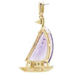 14 Karat Yellow Gold Amethyst and Diamond Sailboat Pendant