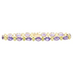 14 Karat Yellow Gold Amethyst and Peridot Bracelet