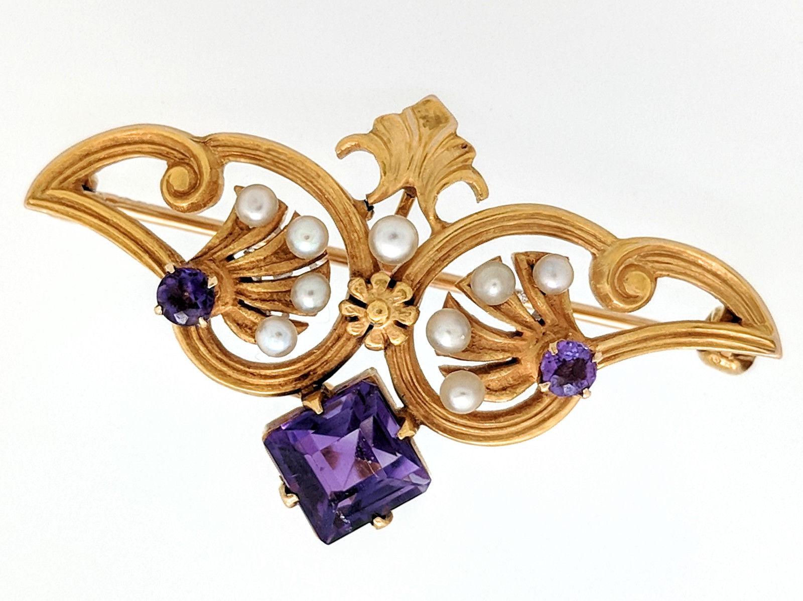 14K Yellow Gold Amethyst and Seed Pearl Estate Brooch Pin

You are viewing a Vintage Amethyst & Cultured Seed Pearl Brooch Pin.

This brooch is crafted from 14 karat yellow gold and weigh 4.1 grams. It features (1) 6mm x 6mm princess cut amethyst,