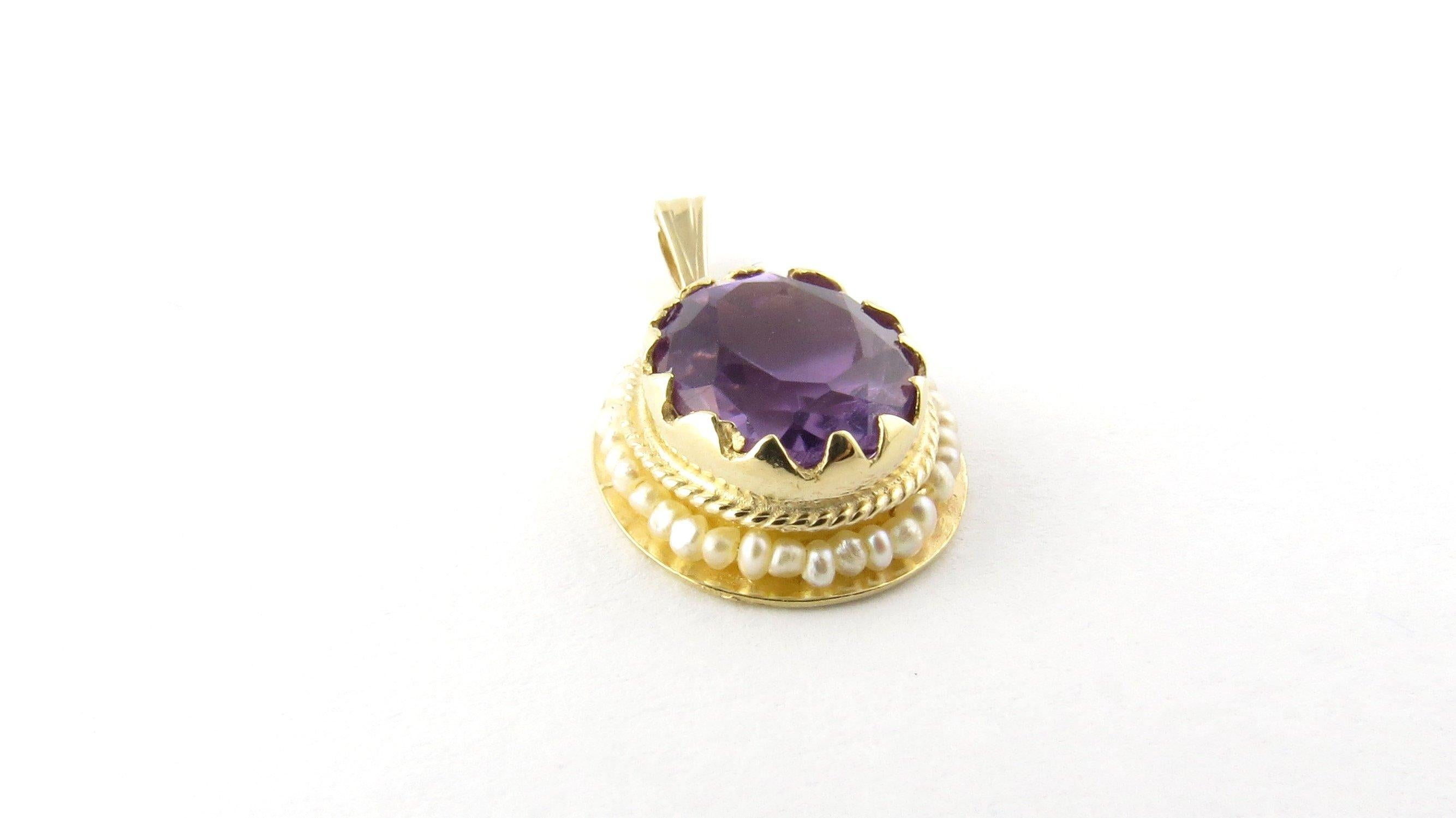 Vintage 14 Karat Yellow Gold Amethyst and Seed Pearl Pendant- 
This lovely pendant features one oval amethyst stone (11 mm x 10 mm) surrounded by delicate seed pearls and set in meticulously detailed 14K yellow gold. 
Size: 17 mm x 12 mm (actual