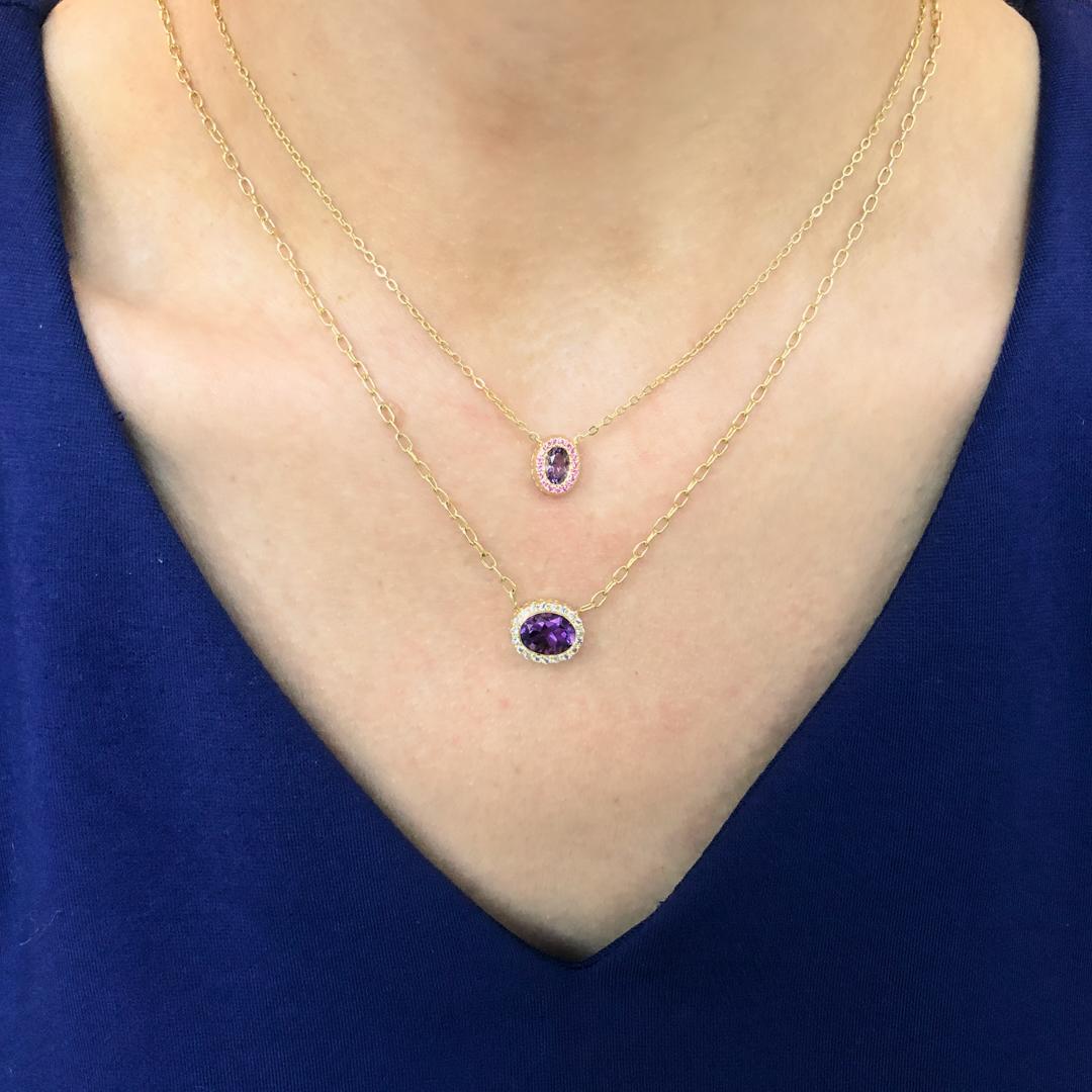 14k Yellow Gold Amethyst Pendant (1.80cts) in a Tanzanite Halo (0.20cts) in Signature CA Bezel on Cable Chain.

If purple or lavender are special to you, or you were born in February, this piece is waiting... The deep and gorgeous colors are