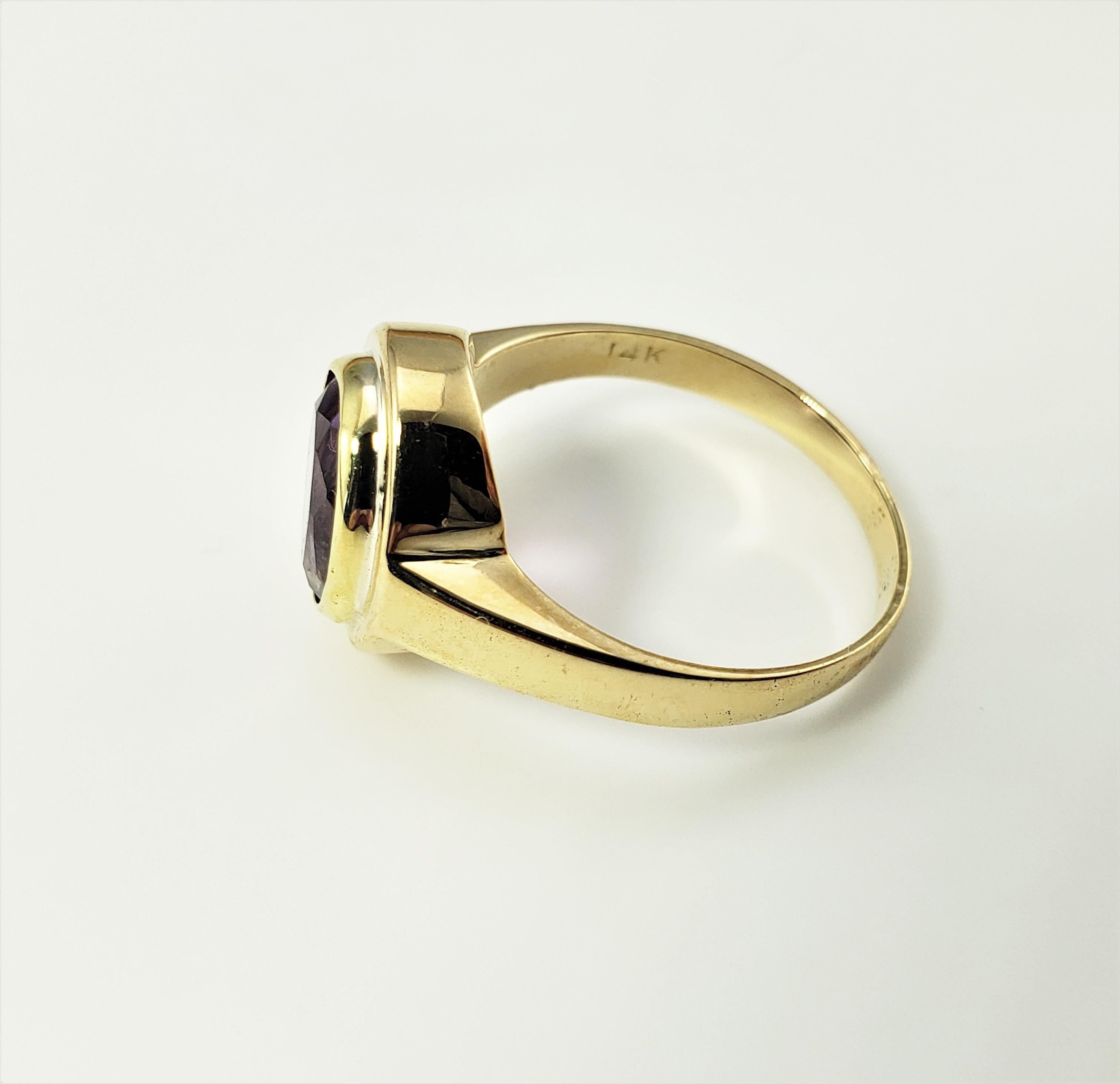 Oval Cut 14 Karat Yellow Gold Amethyst Ring