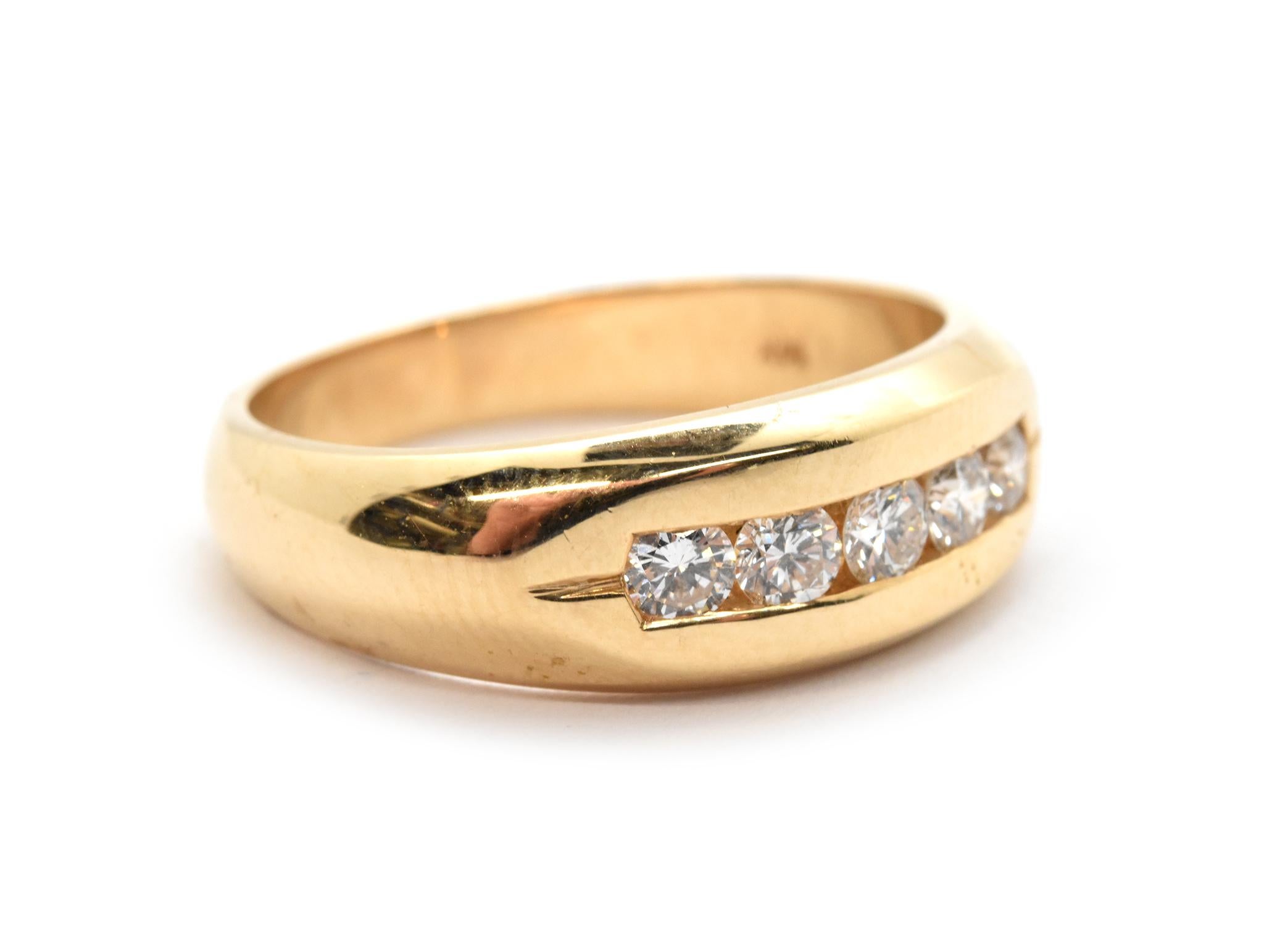 This gorgeous band is made in 14k yellow gold, and it holds channel-set round brilliant-cut diamonds. The diamonds have a total weight of 0.25ct, and they are graded G in color and VS-SI in clarity. The band measures 8mm wide, and it weighs 6.3