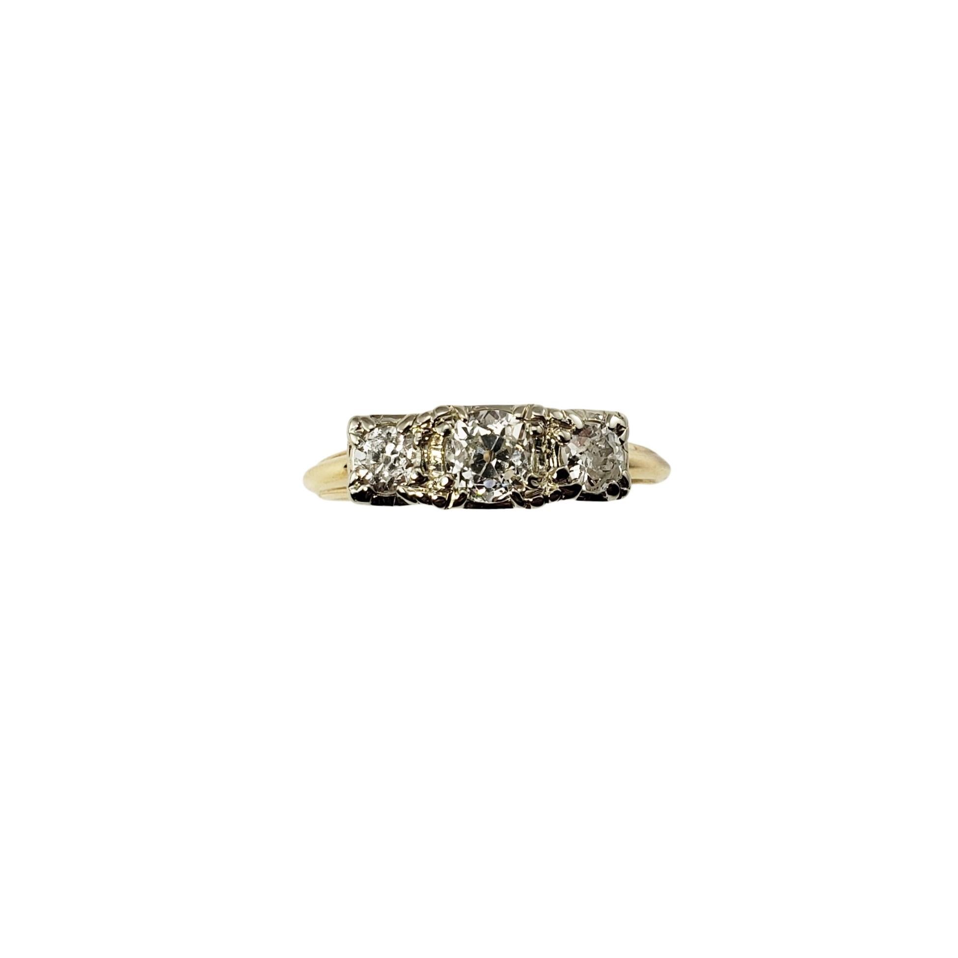 14 Karat Yellow Gold and Diamond Ring Size 5.5

This sparkling ring features three round old mine cut diamonds set in 14K yellow gold.  

Width 5 mm.  Shank:  1 mm.

Approximate total diamond weight:  .60 ct.

Diamond color: G - H

Diamond clarity: