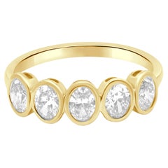 14 Karat Yellow Gold and 5-Stone Bezel Set Oval Cut Diamond Band