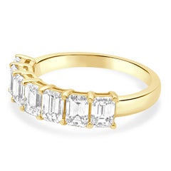 14 Karat Yellow Gold and 7-Stone Emerald Cut Diamond Band