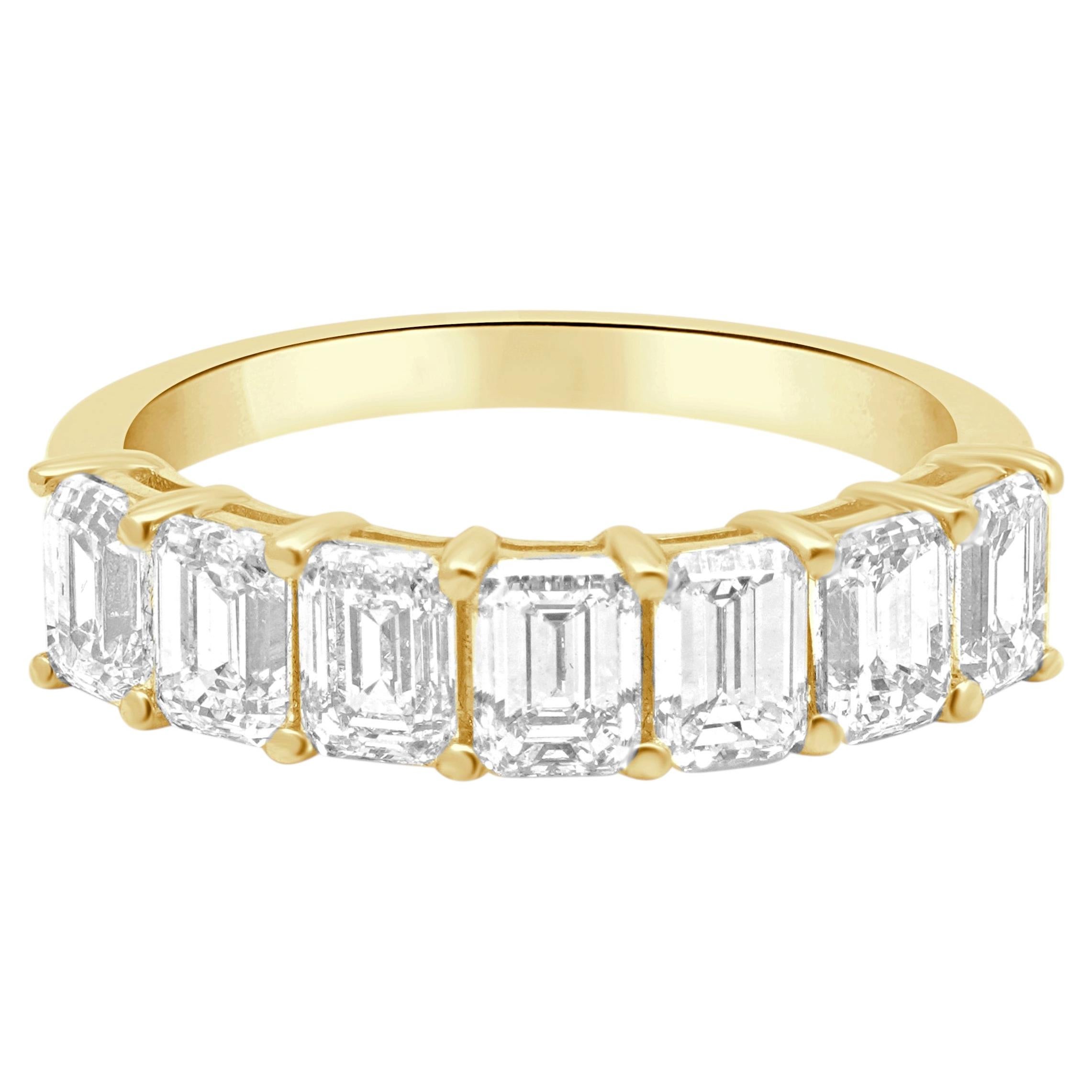14 Karat Yellow Gold and 7-Stone Emerald Cut Diamond Band