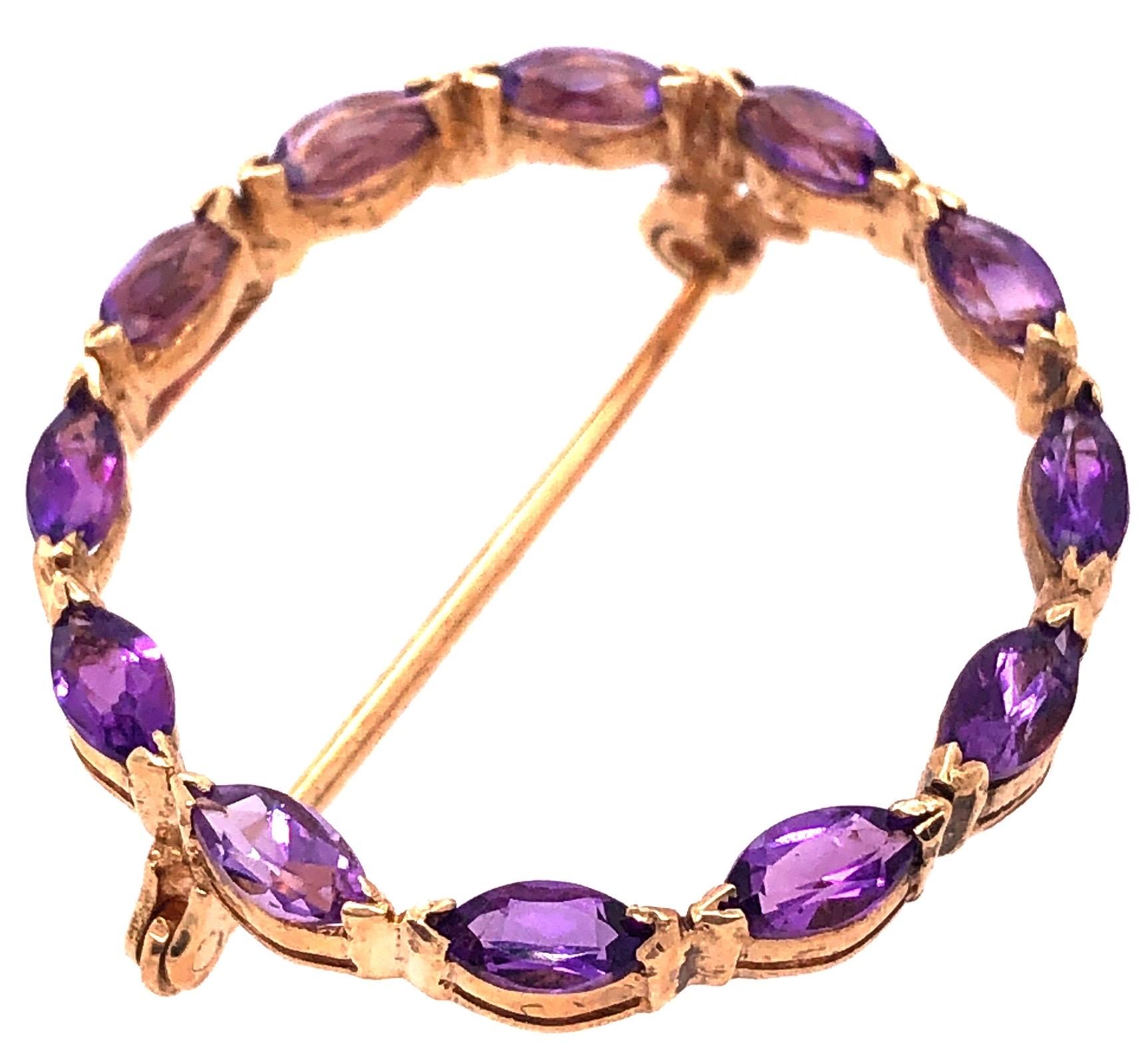 Modern 14 Karat Yellow Gold and Amethyst Circle Brooch For Sale