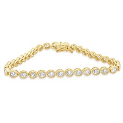Bracelet en or jaune 14 carats et diamant ovale serti sur lunette