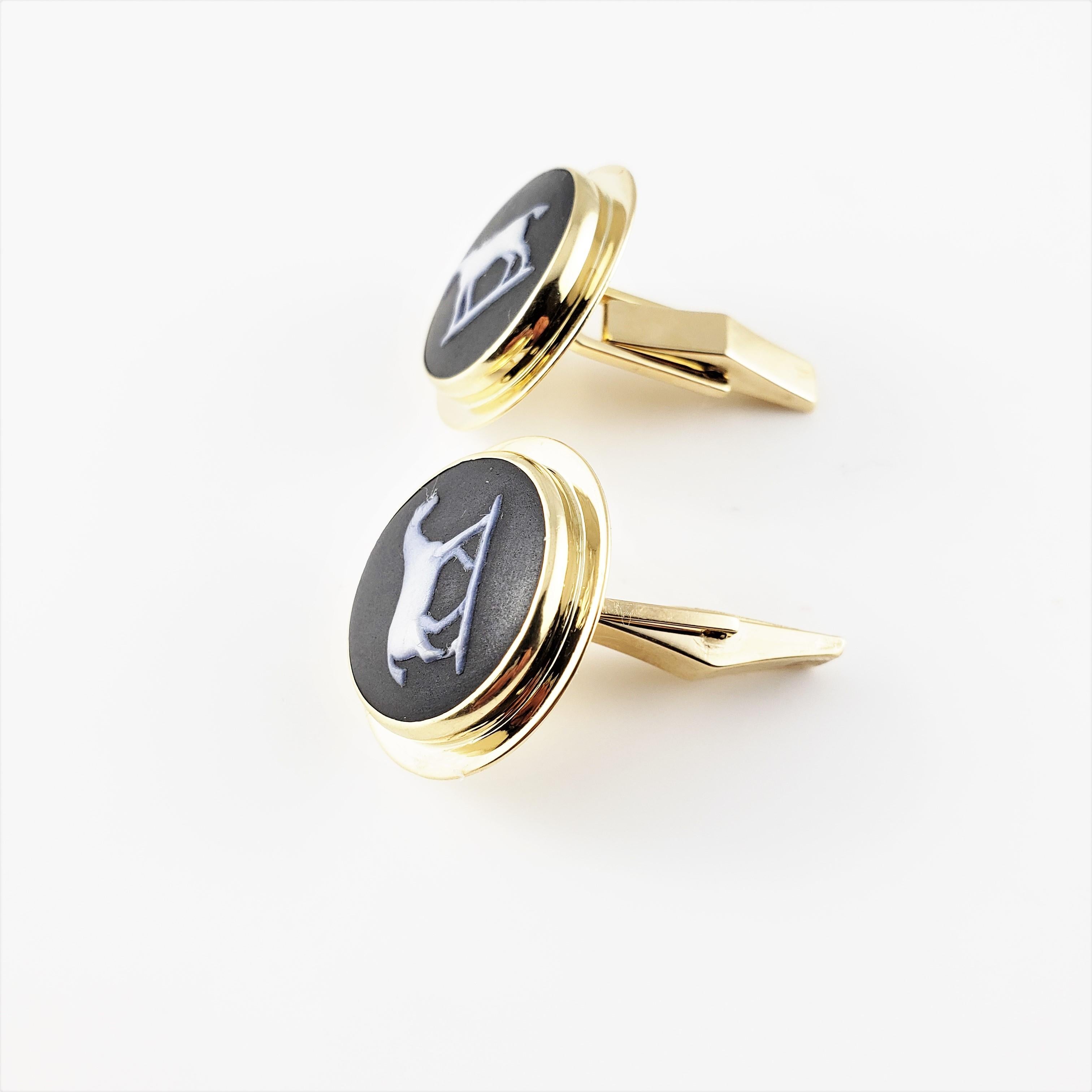 Vintage 14 Karat Yellow Gold and Black Jasperware Horse Cufflinks-

These classic cufflinks feature an elegant horse crafted in black and white jasperware and set in 14K yellow gold.

Size: 24 mm

Weight: 8.4 dwt. / 13.2 gr.

Stamped: 14K