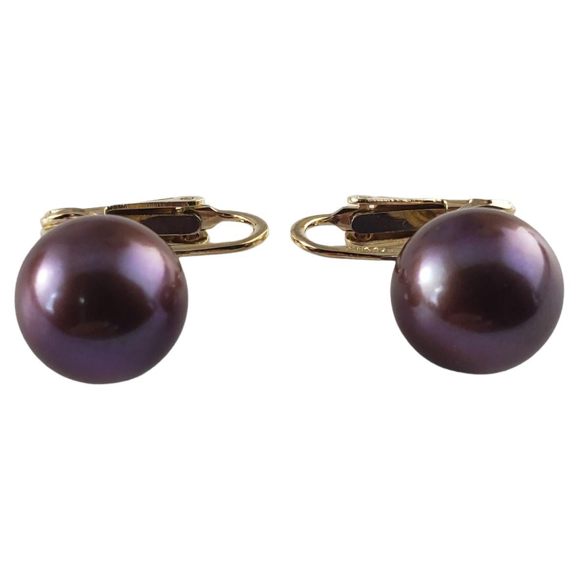 14 Karat Yellow Gold and Black Pearl Clip On Earrings For Sale