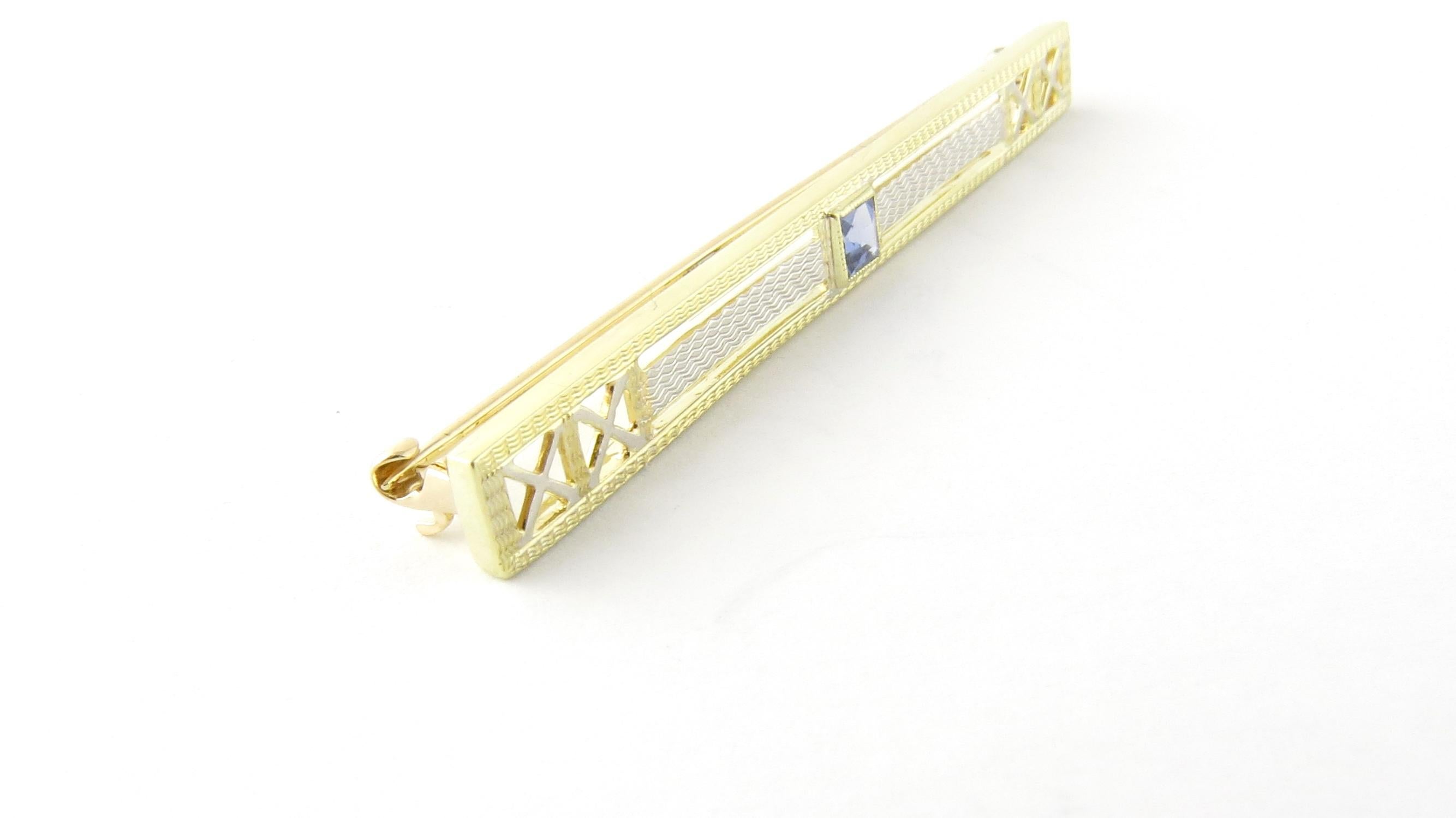 Women's 14 Karat Yellow Gold and Blue Topaz Pin / Brooch For Sale