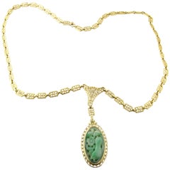 14 Karat Yellow Gold and Carved Jade Necklace