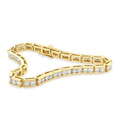 14 Karat Yellow Gold and Channel Set Round Diamond Inline Bracelet