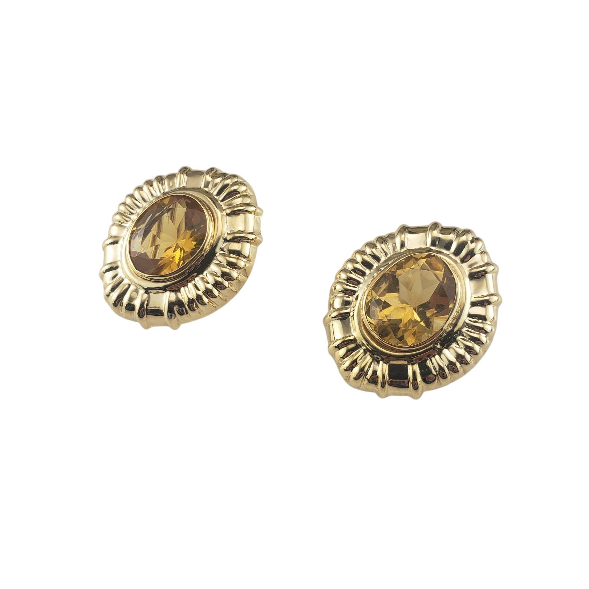 Orecchini Omega Back in oro giallo 14 carati e citrino, certificati JAGi...

Questi eleganti orecchini presentano ciascuno una pietra di quarzo citrino dal taglio ovale (12 mm x 9,6 mm) incastonata in oro giallo 14K dai dettagli meravigliosi.