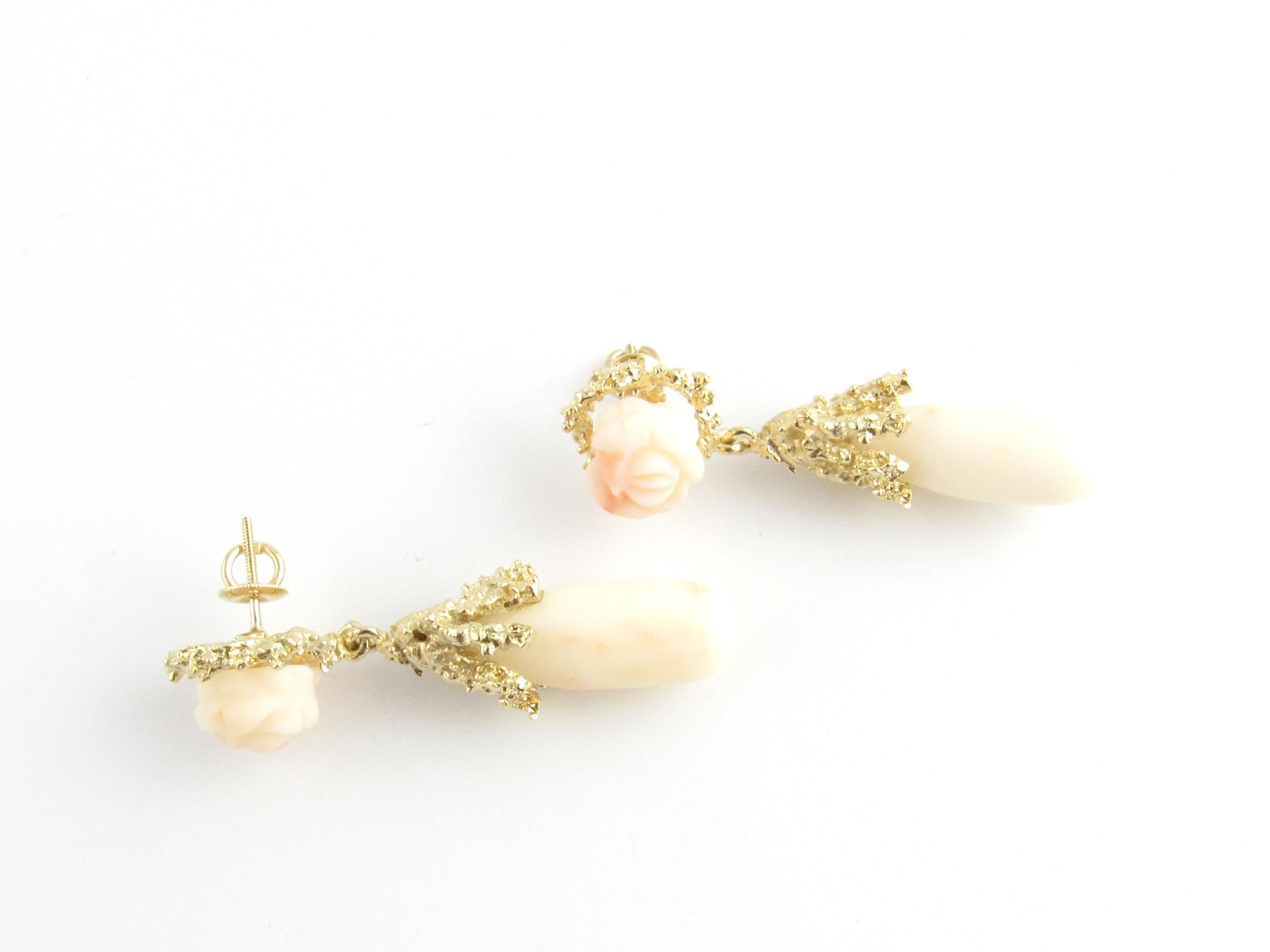 Vintage 14 Karat Yellow Gold and Coral Earrings

These lovely earrings are crafted in stunning pale pink coral set in beautifully detailed 14K yellow gold. Push back closures.

Size: 47 mm x 13 mm

Weight: 10.8 dwt. / 16.8 gr.

Stamped: 14K

Very