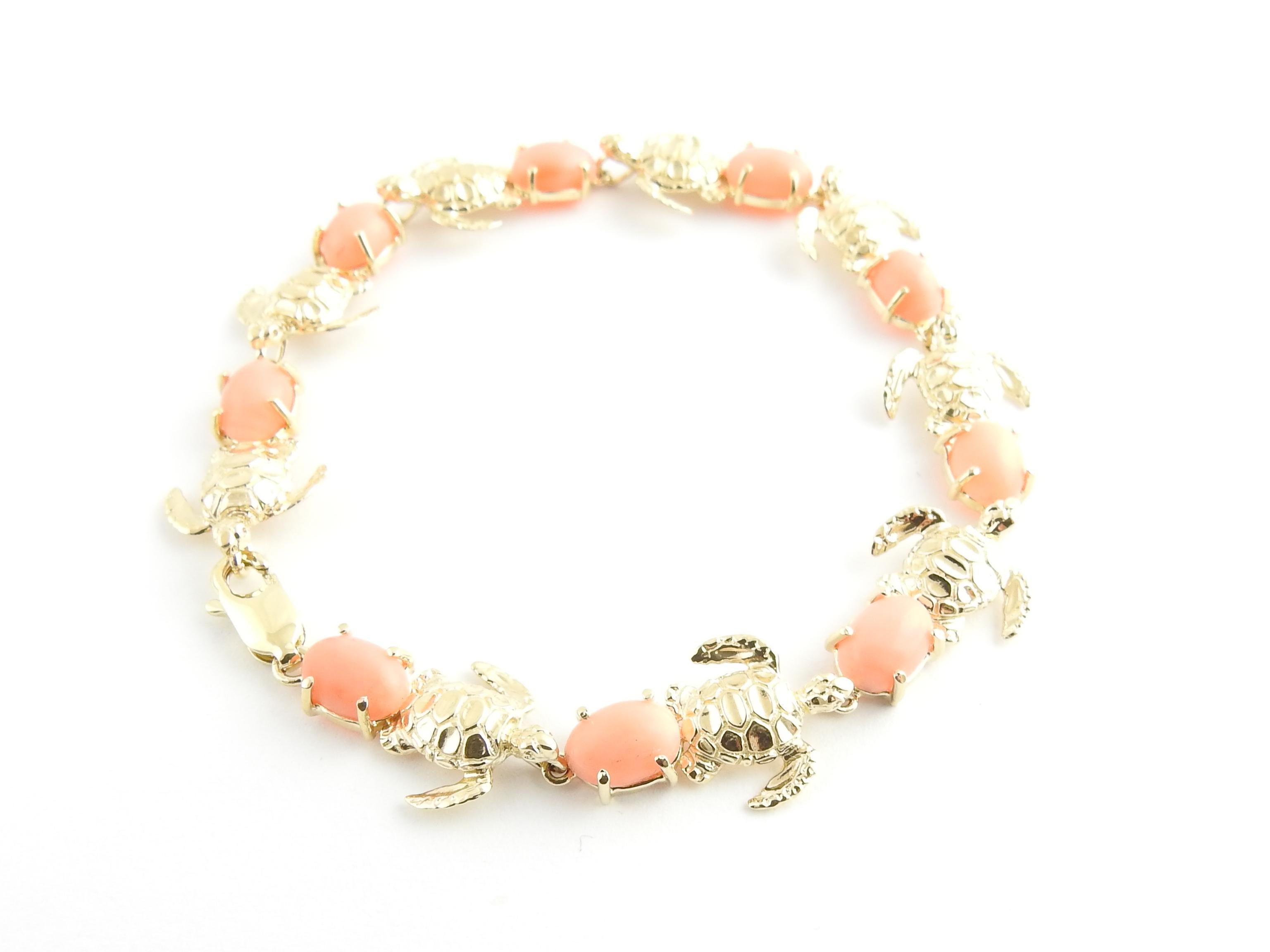 Vintage 14 Karat Yellow Gold and Coral Sea Turtle Bracelet

This lovely sea turtle bracelet is accented with nine oval coral stones (8 mm x 6 mm) crafted in 14K yellow gold.

Size: 6.75 inches

Weight: 6.6 dwt. /10.3 gr.

Stamped: 585

Very good