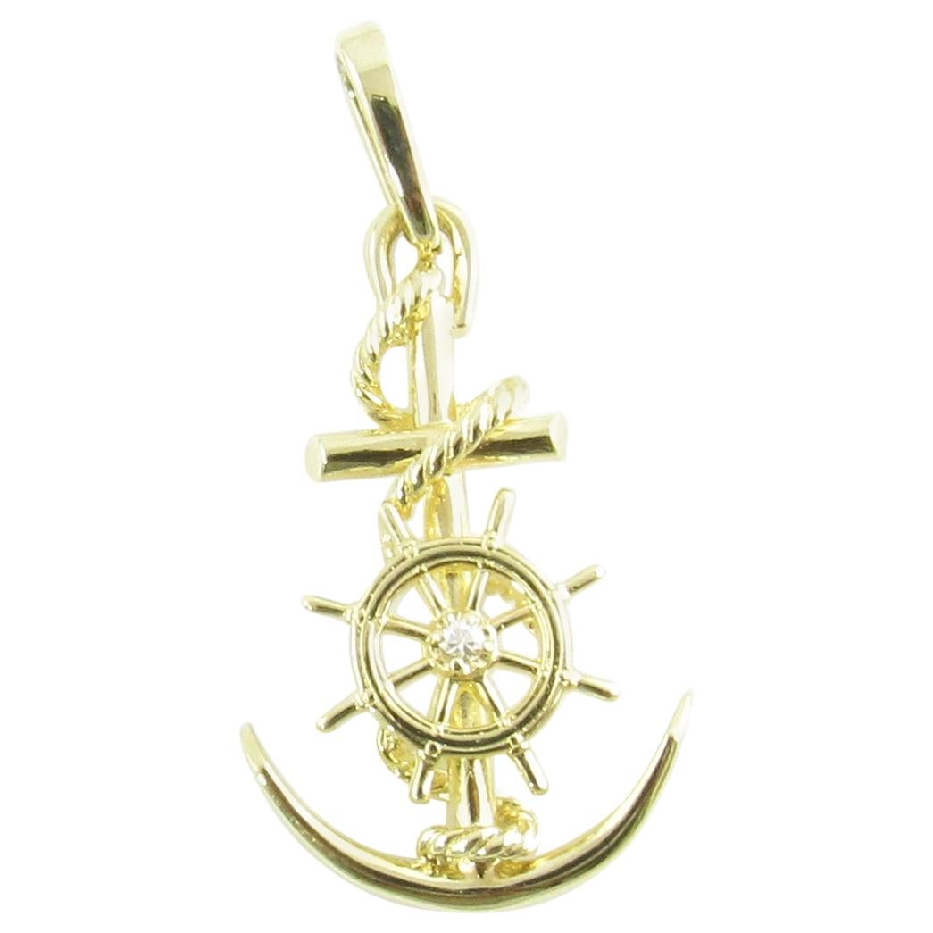 14 Karat Yellow Gold and Diamond Anchor and Ship
s Wheel Pendant