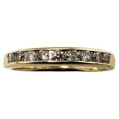 14 Karat Yellow Gold and Diamond Band Ring Size 5.5