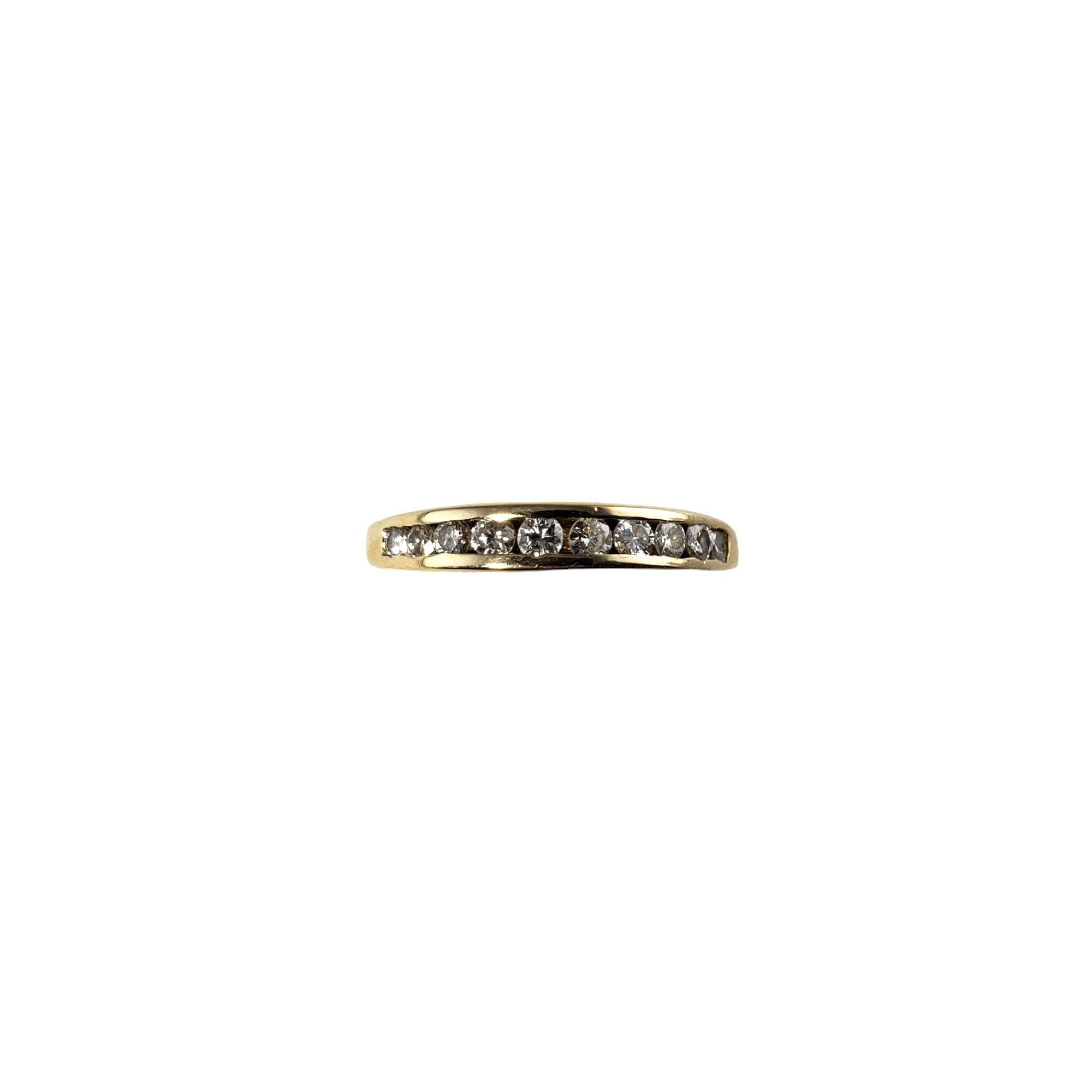 Vintage 14 Karat Yellow Gold Diamond Band Ring Size 6.25-

This sparkling band features nine round brilliant cut diamonds set in classic 14K yellow gold. Width: 3 mm. Shank: 2 mm.

Approximate total diamond weight: .27 ct.

Diamond color: G

Diamond
